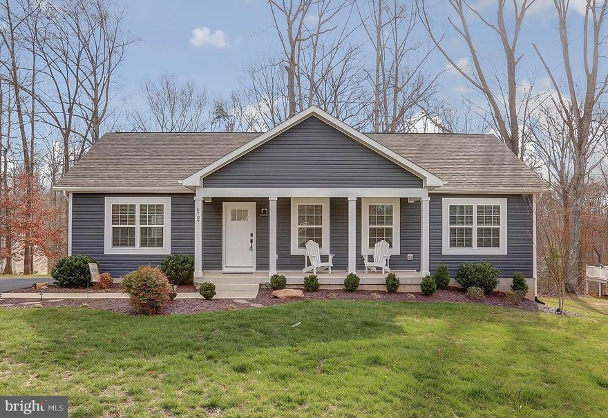 Upgrade your life at 5707 Dogwood Tree Lane, a completely furnished, craftsman-style water access home located in the coveted Wyndemere subdivision at Lake Anna, Virginia.  Recently constructed, this beautiful home features approximately 2,800 square feet of spacious living space, centered around a large great room with vaulted ceilings showcasing incredible exposed wood beams, LVP flooring, along with 3 spacious bedrooms, 2.5 bathrooms, a large finished basement, and a fun golf cart that conveys with purchase!  Situated on a well-manicured lot with a paved driveway and lots of curb appeal, this property provides the perfect combination of comfort and luxury.  The open-concept layout of the main living area creates a spacious and inviting atmosphere, perfect for both relaxing and entertaining; the great room with vaulted ceilings, open kitchen, and dining room all seamlessly connect in one warm inviting space.  The kitchen features exquisite granite countertops, stainless steel appliances, a large island, and an abundance of cabinet space.  Unwind in the large main-floor primary suite, which offers a massive walk-in tile shower with glass door, double vanity, a large stand-alone bathtub, and walk-in closet.   At the other end of the house, your guests will enjoy two spacious guest bedrooms and a full bath between.   Enjoy movies, games, and recreation in the massive finished basement, a perfect space for spreading out and having fun.  The basement also has two unfinished rooms that can easily be converted into additional bedrooms, studies, gyms, or storage rooms.   Unwind on the large back deck, perfect for enjoying a morning coffee or evening cocktail. The backyard offers plenty of space for outdoor activities and gardening, and the property backs up to a wooded area for added privacy.   Since this home was constructed, the seller has finished the basement, added a paved driveway, added crown molding, a retaining wall in the back yard, hardscaping, and new light fixtures.  One of the most exciting features of this property is the included golf cart! Imagine cruising around the Wyndemere subdivision in style,  driving down to your very own boat slip for a sunset cruise (slips are leased in Wyndemere), or just enjoying a relaxing drive along the lake with your family.  Don't miss your chance to own this exquisite property in the heart of Lake Anna. With its prime location, luxurious features, and included golf cart, 5707 Dogwood Tree Lane is truly a one-of-a-kind opportunity.  Schedule your private showing today and make this dream home a reality.