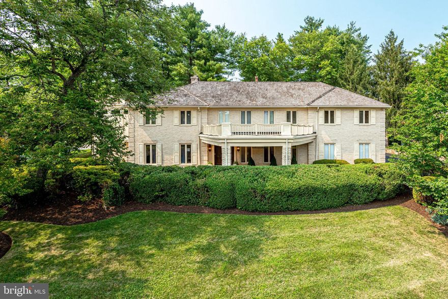 Incredible value in one of the most desired neighborhoods in McLean on a Half Acre lot Stately custom-built Expanded Brick Home has 5 bedrooms (upstairs!), 6 full baths, 2 half baths, and has 8,330 Finished Sq Ft!   Owners suite has 2 separate baths + 4 walk-in closets...a dream come true!   Fantastic open floor plan with Updated Eat-in Kitchen features granite counters, white cabinetry, peninsula island with seating, pantry, stainless steel appliances (including new wall oven & wine fridge), 2 cooktops, and large open space for kitchen table. Family Room off kitchen with double sided gas fireplace with brick accent wall. Large, sun-filled 2-story Sunroom Addition with recessed lighting, skylights, lots of windows and glass doors to patio - open floor plan allows for 2nd sitting room/playroom/2nd office! Formal Living Room with electric fireplace, marble mantel and crown molding. Dining Room with beautiful crown and chair molding, ceiling medallion and new chandelier, and built-in cabinets. Lounge/Office with wet bar, fireplace and built-in cabinets. Mud Room with utility sink, storage closets, washer/ dryer, glass door to backyard and 2nd staircase to upper level. Plus, 2 main level Half Baths. Upstairs, the Owners Suite boasts tray ceiling, 4 custom walk-in closets, and TWO separate owners' bathrooms - both with large vanities and showers with benches. Generously sized 2nd & 3rd Bedrooms with Juliet balconies that overlook the Sunroom Addition, great walk-in closet space and updated Jack and Jill Bathroom. Spacious 4th Bedroom with 2 closets, ceiling fan and 4th Full Bath with new double sink, shower tub, and linen closet. 5th Bedroom overlooks patio & 5th Full Bath located near the back staircase. Don't miss the Large Storage Room with window - spacious enough to be a private Office. On the lower level, newly renovated Rec Room with double sided fireplace with impressive stone mantel, recessed lights and large stone wet bar with sink. Large Den - great as guest room with easy access to 6th Full Bath. Separate Storage Room. Located on a private 0.48 acre lot with landscaped front yard & flat, fully fenced backyard with stone patio. NOTE: Easily expand backyard fence along Lawton St to enlarge the fenced yard significantly... it connects to the double doors from the family room addition. Conveniently located, just a half mile to 495 to GW Parkway, 2 mi from Downtown McLean, 3 Miles to Metro & commuter routes, and 10 mins to Tysons Corner Center.