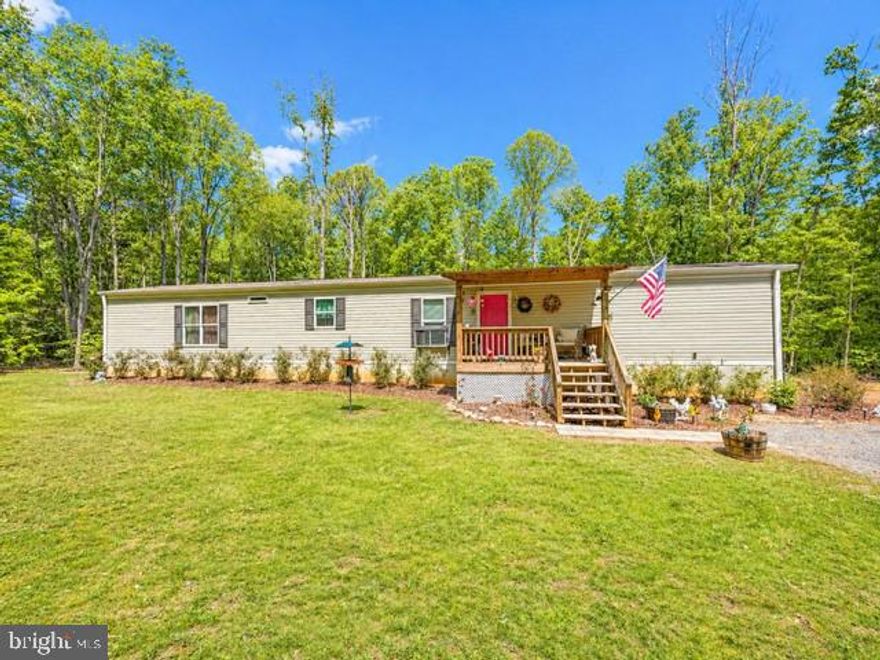 Location, Location, Location! If you are looking for privacy and convivence this is the property for you.  
Welcome to this beautifully maintained 3-bedroom, 2-bath home situated on just over 2 acres of peaceful, private land. Built approximately 5 years ago, this home offers modern comfort with thoughtful design throughout.
Step inside to find durable luxury vinyl plank (LVP) flooring and an open, inviting layout
ideal for everyday living. The home features exposed beams that add warmth and character, creating a stylish yet comfortable at atmosphere.
The spacious kitchen, with a large island and living areas flow seamlessly, while the bedrooms provide ample space and functionality. The kitchen features beautiful cabinets and a farm sink. The primary suite includes a walking closet, a private bath, offering a relaxing retreat, with a soaking tub, separate tile shower and double vanity.   Additionally, there are two more guest rooms with large closets and a lovely bathroom with a tub/shower combination to accommodate guests. 
Outside, enjoy the expansive yard and natural surroundings, perfect for outdoor activities,
gardening, or simply taking in the quiet setting. There's a beautiful front deck and rear deck that is perfect for entertaining. The property offers a balance of open space and wooded privacy, giving you room to spread out while still feeling tucked away.
If you’re looking for a newer home in excellent condition with acreage and a peaceful
setting, this property is must-see.