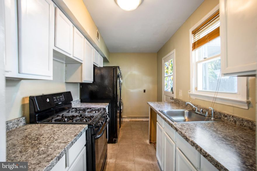 An exciting opportunity to put some finishing touches on a cozy home. The wall-to-wall carpet is new and has fresh paint throughout. Brand new roof! While this is an investor's dream, there is not much left to make this property shine. Outdoors is the real showstopper with a large lot with room for entertaining several guests. Turn this humble abode into a remarkable home. 

Just minutes from the District of Columbia, located in a burgeoning and bustling community, this property holds the key to future growth and profitability. Seamlessly continue adding your touches to create a valuable asset in an area with great potential. With the groundwork already laid, you can save time and resources while making your mark on this promising endeavor. Sold AS-IS. Partially renovated and almost complete. Make this gem yours!