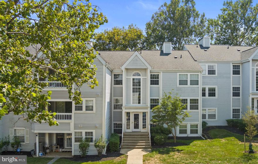 Welcome to this freshly updated 2-bedroom, 2-bathroom second-floor condo, perfectly situated in a secure building and offering serene privacy with a wooded backdrop. Featuring a front-to-back layout, this unit is flooded with natural light, creating a warm and inviting atmosphere throughout.
Highlights include a beautifully remodeled primary bath, updated second bath, new A/C 2026, new washer/dryer 2026, new refrigerator 2021, new dishwasher 2022. Freshly painted and new luxury vinyl plank flooring throughout. You will love the spacious living area with a slider to a private, covered deck – ideal for relaxing or entertaining. There is ample parking for residents and guests with a convenient location close to Route 100 and Snowden River Parkway – easy commute and access to local amenities.
Whether you're a first-time buyer, downsizer, or investor, this move-in-ready condo is a must-see. Enjoy low-maintenance living in a peaceful, tree-lined setting – schedule your showing today!