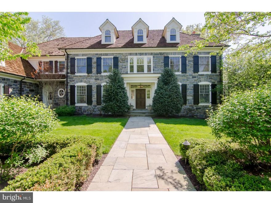 Treat yourself and your family to breathtaking beauty every day, afforded by a wonderful private cul-de-sac setting within coveted Harriton Farm. Savor the gorgeous grounds and overlook conserved meadows while enjoying a fabulous outdoor pool oasis and phenomenal living space that is beyond elegant. 1401 Lanes End is a stunning traditional-style estate house in the prime Main Line, surrounded by striking stone and further distinguished by classic window shutters and dormers. This luxurious retreat is delightfully secluded, yet conveniently located minutes from Philadelphia. Masterfully created by the prominent Pohlig Builders in Villanova, Harriton Farm raises the bar on new construction standards and modern upscale design on the Main Line. This magnificent, finely appointed 6 bedroom, 6.2 bath home reflects grand character, brought forth by such elegant touches as random-width wood flooring, extensive millwork, moldings and built-ins, gas fireplaces, massive openings between rooms, enormous windows and custom cabinetry throughout. The open, flowing layout was made for comfort and entertaining, with formal living and dining rooms, and a top-of-the-line chef's kitchen that spills into a sun-bathed breakfast room and fireside coffered ceilinged family room. Both the main and lower levels extend out to lovely rear flagstone terraces for seamless indoor-outdoor parties and lead down to the large swimming pool/patio, hot tub and blissful fenced yards. A charming wood-clad office with a fireplace is perfect for reading or working quietly. The mudroom off the built-in 3-car garage offers cubbies and accesses the powder room. On the upper level sits a spacious master suite that is exquisite and peaceful, with custom accents like a hand-painted porcelain tiled gas fireplace. Huge his/hers walk-in closets, dressing and sitting areas, and a luxurious spa bathroom complement the oversized master bedroom. You'll also find 3 additional en-suite bedrooms, a Jack & Jill bath and laundry on this level. On the 3rd floor sits another bedroom suite for guests. An amazing lower level with a full bar, game area, home theater, wine cellar, gym, sauna, full bath, 2nd laundry, media room and glass doors to the patio assures you hours of pleasure. A walk-up attic, central air, central vacuum, air filtration, generator, water treatment and security systems are among the other thoughtful highlights.