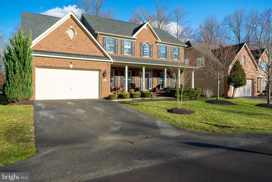 Price Reduced and Ready for a new homeowner.
Welcome to Oak Creek, gated community with a golf, clubhouse, walking trails, tennis courts and a pool and so much more... 

Over 5200 sq ft of Living in this Beautiful ALL brick home that has hardwood floors through the main level with a Country Style porch that allows you to sit back relax and wave at your neighbors, upon entering you will see that everything is here, Two-Story Foyer with Living Room and Separate Dining Room to your right/Private office space to your left and many other details like 1st floor powder room/open mud area that leads to the 2 car garage. Fireplace in Family Room that contains built in shelving and cabinet space/The Open Kitchen is exactly what you are looking for, with modern design for fluid and free space flow/elegant countertops and plenty of cabinet space with a sunroom connected that allows for plenty of space for comfort. This home offers  4 Bedrooms and 4 and 1/2 half Bathrooms of elegance throughout. 

Come check out the upper level for yourself.
Lower-level walkup basement has Brand New Carpet and tons of open space with a full bathroom, An Amazing Theater room for family time, and a Backyard featuring an entertainer's dream deck, patio with a private firepit.
So convenient to more shopping, more dining and entertainment with easy access routes to highways, Washington, D.C., Virginia, Annapolis, MD, Baltimore, MD, METRO rail about 10 minutes away. Come On Home. Your Dream is Waiting.  Home is eligible for the $10k Welcome Home Program.