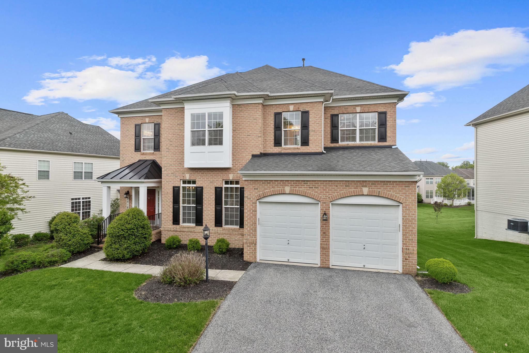 Open house Saturday May 13th from 1-3pm! Welcome home to this stunningly beautiful brick-exterior colonial, the largest model in the highly sought-after gated community of Creekside at Quarry Lake! This designer home features high-end appliances and sophisticated architecture, immediately noticeable from the moment you arrive on the main level through the two-car garage (with an electric car charger) and into the custom mud room. The open concept floor plan is the ideal setting for entertaining, starting with a formal foyer, flanked by classic style columns, and transitions seamlessly into the living and dining rooms featuring double crown molding, chair railing, and gorgeous hardwood floors that continue throughout. The spacious family room welcomes you with rich accents that highlight the gas-burning fireplace and custom picture molding. Let the gourmet kitchen inspire delectable creations, boasting a center island with a breakfast bar, 42” cabinetry, a ceramic tile decorative backsplash, stainless steel appliances, a breakfast area, and granite counters. The den area provides many possibilities - as an office with a bay window or as a playroom.
Relax and unwind in the tranquil expansive primary bedroom suite offering plush carpet, a sitting or dressing area, custom blinds, two closets (one being a walk-in closet), and an ensuite with separate vanities, a soaking tub, and a walk-in shower. Two additional bedrooms, a hall bath, a bedroom suite, and the convenient upper-level laundry complete the sleeping quarters.
A fully finished lower level offers a plethora of possibilities with a media area, a game area, an exercise area, and a sprawling bedroom suite. Enjoy morning coffee, tea, or evening cocktails on the rear deck with an enclosed space for entertaining family and friends for an indoor-to-outdoor experience. In close proximity to an array of amenities awaits in the Quarry Lake shopping area with an in-ground pool, tennis courts, lounge, and meeting area. The home is in quick access to major commuter routes including I-83, I-795, I-95, and I-695 for travel to Baltimore’s Inner Harbor, Washington D.C., and New York.