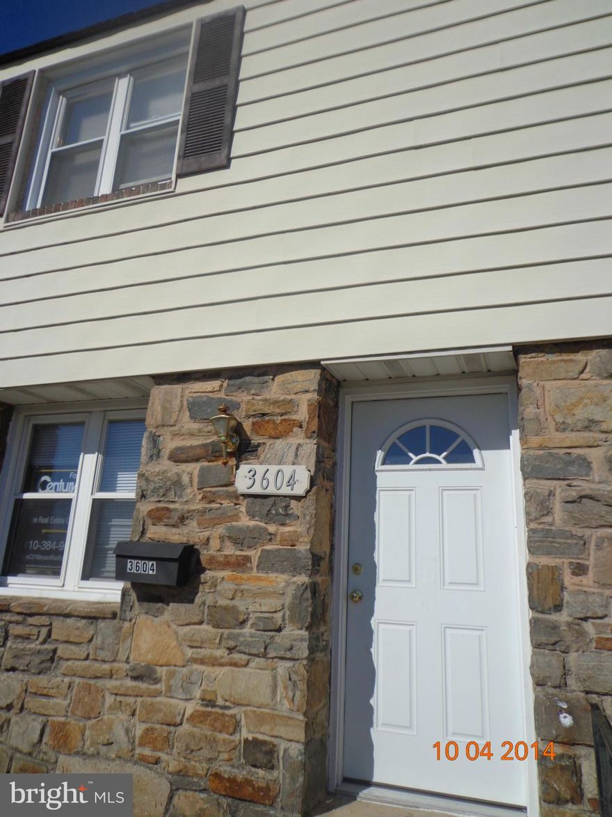 Reduced!   Refinished townhouse w/new kitchen cabinetry with center island. Full Bath on 1st floor and 2nd floor, full basement unfinished.  Hardwood in Diningroon, Livingroom and 1st Bedroom. Parking in rear of home in the alley. Gas furnace only 4 yrs. old Selling "as-is"  in good condition and has been certified LEAD FREE