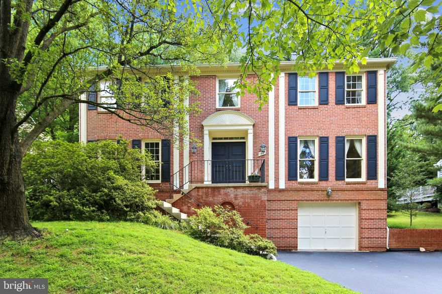 Beautiful Colonial On Wooded Lot in Desirable FALLSREACH Community In Potomac. Character and charm await you! A MUST SEE! This stunning home is tastefully updated to include gleaming hardwood floors on all levels. Double door entry opens to a welcoming foyer leading to the gracious formal living room and dining room. The library/office is finished with beautiful wood panels. The family room includes a gas burning fireplace with a magnificent stone wall leading to a beautiful deck to enjoy your private and peaceful oasis. The updated gourmet kitchen offers GE Profile appliances, a large custom island, granite countertops, granite tiles kitchen floor, and an eat-in area with a bay window overlooking the serene private yard. The upper level includes an expansive master bedroom with an en-suite, offering separate shower, a free-standing soaking tub, and large closets. There are three additional spacious bedrooms, an additional full bath, and a half bath and a laundry room located on the upper level. The finished walkout lower level offers a large Rec room, Game Room, and a full bath. Large windows with views from every room to the outdoors. All window treatments convey. This beautiful home comes with a long 2-car tandem garage.