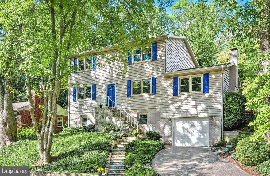 Refreshed and ready for new owner 2900 sq ft. of thoughtfully finished living space. ! Freshly painted & sparkling with  new hardwoods  & new carpet too! This  4 bedroom /3.5 bath is classically Arlington. Beautifully landscaped with mature shade trees & hardscape. Family friendly flowing floor plan. Kitchen with island opens to family room with fireplace & direct access to large deck, play area on upper terraced level. A  Skylight enhances the abundant natural light in family room and kitchen.. On this level are also a large formal living room, dining room, powder room and large 1st floor laundry, so convenient!. Upper level includes a large owner's suite with walk in closet & spacious bath w/ large shower.  This level also includes 2 additional generously sized bedrooms and an upgraded hall bath. Lower level is above grade & south facing & includes large rec room,  generous storage area, full bath and 4th bedroom/or office.  Direct private access from garage on this level.  Newer HVAC (4 years), insulated, energy- efficient, double- pane  windows. supplemental attic insulation complete this well maintained home.Wonderfully and conveniently located in the heart of Arlington just off Lorcom Lane & Lee Hwy.  Close by Zachary Taylor and Potomac Overlook parks. Less than 1/2 mile to Cherrydale library, basketball and tennis courts, soccer & baseball fields, bike lanes, sidewalks, walking trails etc.  Within the Donaldson Run Pool membership boundary, Washington Golf and Country Club (1 mile). Enjoy close by Lee Heights shopping w/bakery, wine shop, restaurants, Starbucks  etc. Commuter's dream w/ public transportation to DC, Tysons, National Airport, GW Parkway, Lee Hwy, I-66.  School tier: Taylor, Hamm, Yorktown.