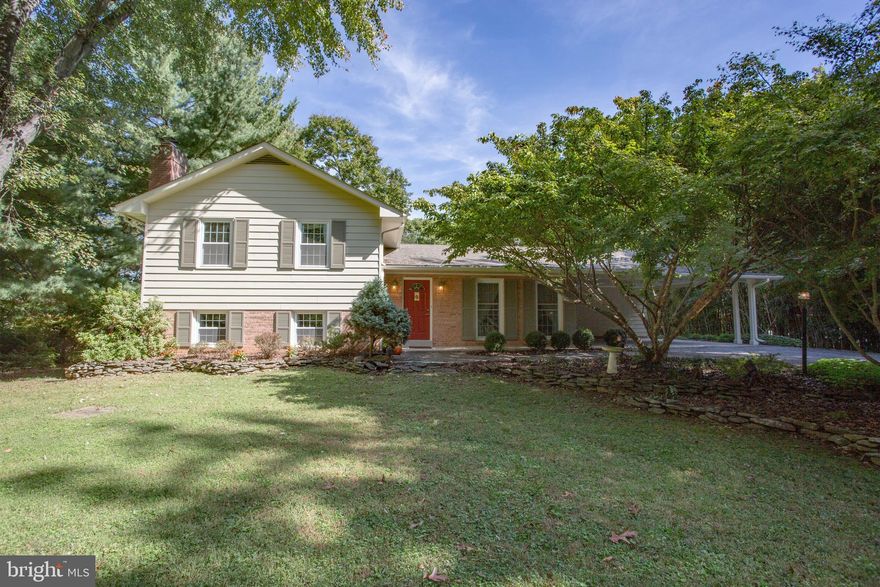 Home is priced $5,000 under recent appraised value! Walk into instant equity! 

Welcome to 22805 Clarkbrooke Drive! Wow, this home is absolutely stunning! The owners have kept immaculate care of the property over the last 20 years. Taking a look from the outside, this home provides freshly painted siding, well-manicured landscaping, and a 2-vehicle carport. Stepping inside, the home presents a spacious foyer with custom tile work. The foyer provides a jaw-dropping view of the first-floor drawing room and the open concept kitchen. Walking into the drawing room you will be greeted by a custom bar area complete with a granite countertop, hardwood flooring, and beautiful stone work. The bar provides access to both the dining room and kitchen. This is perfect for having family/guests over and presenting a buffet style meal as well. You will love the arched entryways throughout the first floor. The kitchen is breathtaking with its recessed lighting, vaulted shiplap ceiling, hardwood flooring, oversized island, granite countertops, dual ovens, coffee nook, double pantry, and breakfast table. The kitchen also features large windows, 2 skylights which provide tons of natural light, and built-in selves throughout for your design tastes. A side door will lead you outside to the patio area and large shed. Back inside, take the stairs located at the foyer up to the bedroom floor. This floor contains 3 full bedrooms and 1 full bathroom. The bedrooms all present hardwood floors and lots of natural light. The bathroom shows tile and an additional skylight. Walking down to the living room floor you will be greeted by new carpet, a wood fireplace, built in cabinets, recessed lighting, and a second full bathroom. The room features another bar top with its own private sink, perfect for those night caps in front of the fire place. Taking a step down one last set of stairs, you will encounter another large room with luxury vinyl floor, recessed lights, and lots of closet/storage space. To top it all off, this home is nestled within a quiet cul-de-sac. Clarksburg High School is within walking distance just outside of the development. The development is right off of 355, minutes away from 270, and just minutes from the Clarksburg Outlets. Whether you are looking for a family house or entertainment house this home will cover all of your needs! Hurry, it will not last long!