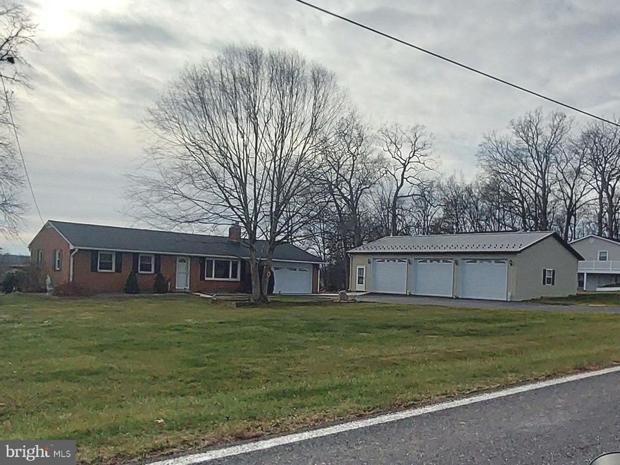 A great opportunity to own this cozy brick Ranch style home  on 0.87 acre country lot.  The owner replaced the roof in 2018, new HVAC system in 2021, remodeled and enlarged kitchen in 2023, new driveway and concrete pad in 2022, and added a 3 car detached garage in 2022.  Currently, the interior of the home is being freshly paInted.  Enjoy the propane brick fireplace in the living room.   Beautifully landscaped, partially fenced backyard.  No HOA - No City Taxes.

Updated pictures will be coming!