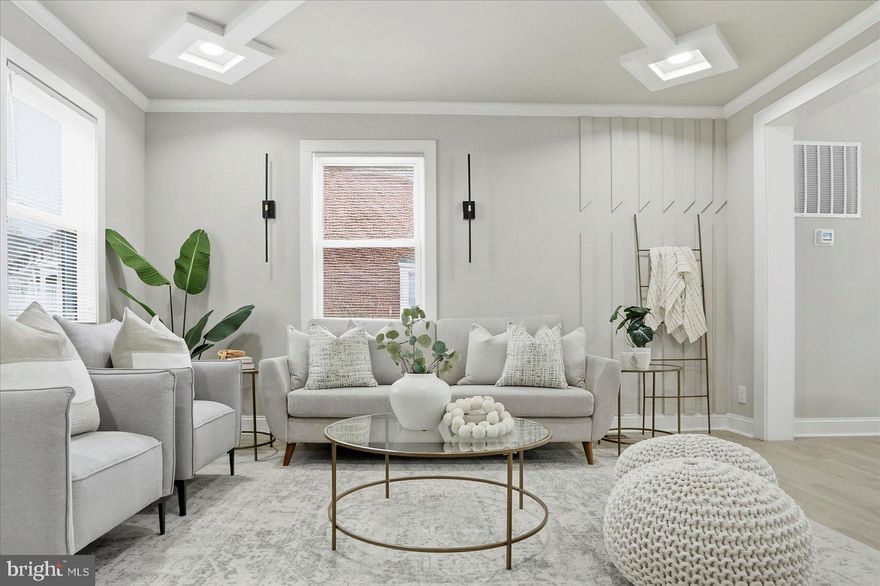 Welcome to this beautifully updated rowhouse featuring 3 bedrooms and 2 full bathrooms, thoughtfully designed for both comfort and style. The primary bedroom includes a dedicated office space, perfect for remote work or a private retreat.
The main level offers a seamless flow from the living room into the dining room, with a cozy sitting area just one step away, ideal for entertaining or relaxing. The home is enhanced throughout by super stylish accents and modern light fixtures that add character and warmth.

The kitchen is complete with a center island, stainless steel appliances, and ample cabinetry—perfect for cooking and gathering.

Downstairs, enjoy a fully finished basement offering additional living or recreational space. Outside, you’ll find a fenced-in yard, a shed for extra storage, and a paved driveway in the rear for convenient off-street parking.

This home blends charm, functionality, and modern upgrades—ready for you to move right in.