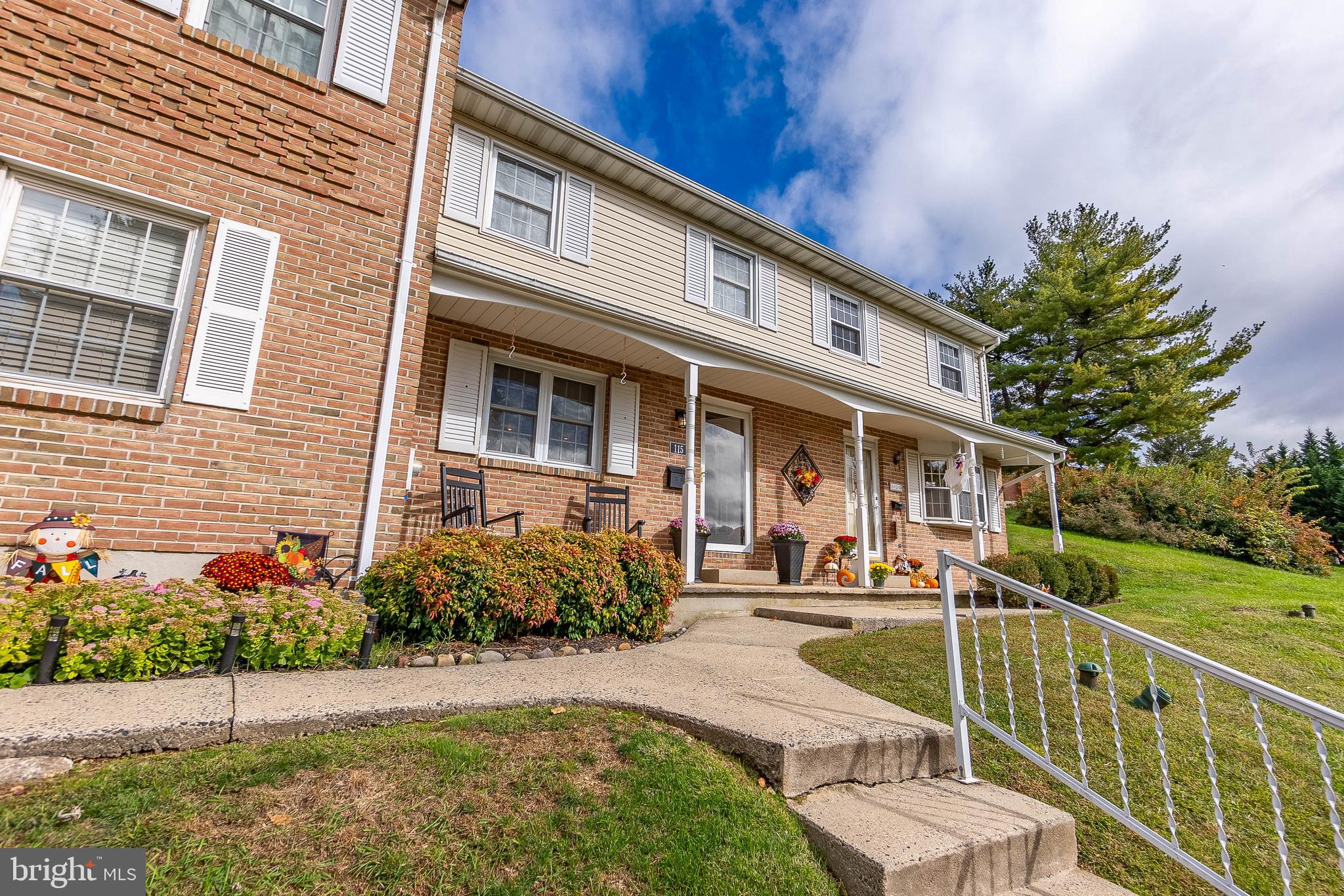 Welcome to 115 Village Drive, a charming 3 bed, 1.5 bath townhouse nestled in the heart of Boyertown. This beautiful home offers the perfect blend of comfort, convenience, and style. As you enter through the front door, you'll be welcomed into a warm and inviting entryway that leads you into a spacious dining room, perfect for hosting family and friends. The well-equipped eat-in kitchen features elegant quartz countertops, a convenient double sink, stainless steel appliances, and efficient gas cooking. Adjacent to the kitchen, you'll find the inviting living room, where a cozy wood burning fireplace serves as the centerpiece. From here, step through the sliding glass door to your private patio, offering a serene outdoor space to relax and unwind. Completing the main level is a conveniently located powder room, with tile floor and marble top vanity. Venture upstairs to discover the primary bedroom, offering a comfortable retreat at the end of the day. Two additional bedrooms and a full bath featuring a tile floor, a luxurious marble vanity, and a double sink can also be found on this level. The walk-out basement has been finished to offer additional living space as well as a laundry area, and additional storage providing added convenience for your daily tasks. Situated in a friendly community, 115 Village Drive is conveniently located near local parks, offering opportunities for outdoor recreation and leisure. Quick access to major roadways ensures that you're never far from the area's shopping, dining, and entertainment options. 115 Village Drive is situated in a picturesque setting with mature tree-lined streets and beautifully landscaped surroundings. The quiet and peaceful neighborhood provides a community pool and a serene backdrop for daily living, making it an ideal place to call home. Don't miss this opportunity!