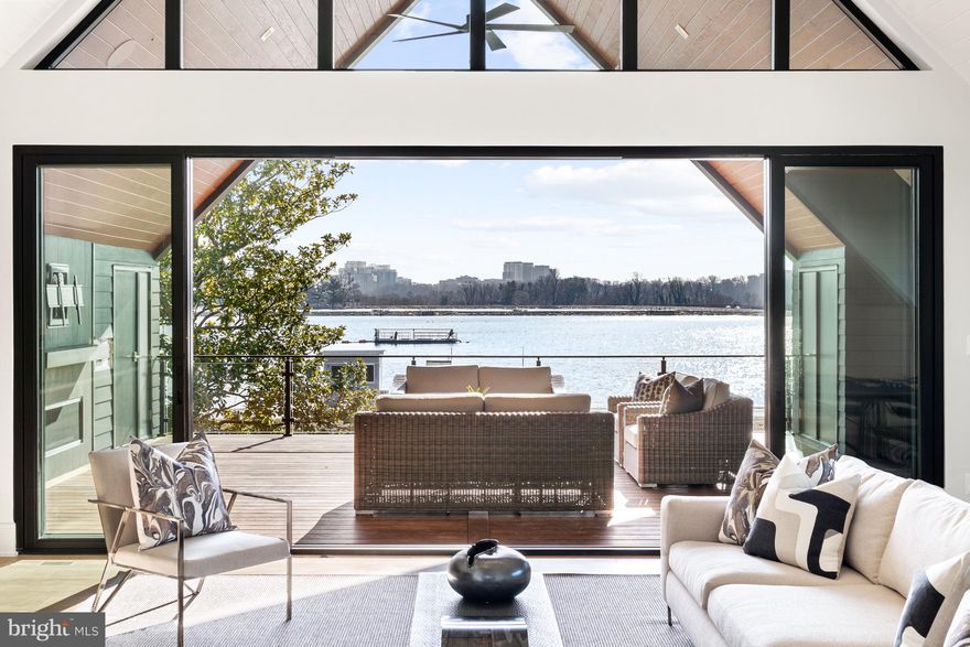 THE HIGHEST SALE EVER IN THE PALISADES!
<br>
<br>
Brush Arbor's newest offering is a modern stunner in sought-after Palisades.  Having been rebuilt from the ground up in partnership with Wellhouse Interior Design, Studio 37 Cabinetry, and Jacobeen Architecture, this home features incredible one-of-a-kind views of the Georgetown Reservoir making this an extremely rare and unique opportunity in the District.  It is truly a must-see as words do not do it justice!
<br>
<br>
 Offering 4 BR, 4 BA, 2HBA across 6,850 SF, this elevator ready home boasts massive windows anchoring the primary spaces as well as access to multiple porches and decks. The contemporary architecture is as impressive as it is functional.  The floor plan was thoughtfully conceived with utmost consideration for maximizing the view and also providing for incredible entertaining and casual everyday living.  The bedrooms and bathrooms are graciously sized and the closets in the primary are very generous. This home also showcases the aesthetics and premium amenities for which Brush Arbor and Wellhouse are known, such as European white oak flooring, the custom tile, cabinetry and lighting, etc. Spectacular architectural features throughout; such as the 18 foot vaulted ceiling on the third level with a massive wall of glass and an 18ft sliding door that leads to a covered rooftop deck with a fireplace.  Sunsets on that porch overlooking the water are breathtaking. 
<br>
<br>
Near parkland, the Palisades Recreation Center & Playground, commercial MacArthur Blvd corridor including BlackSalt and Lupo Verde restaurants, Black Coffee shop, CVS, the Palisades Sunday Farmers Market and the public DC Palisades Library, with excellent proximity to nature trails including Battery Kemble Trail, Capital Crescent Trail, and the C&O Canal Towpath, 4820 Hutchins is indeed the waterfront dream in unparalleled sophistication.