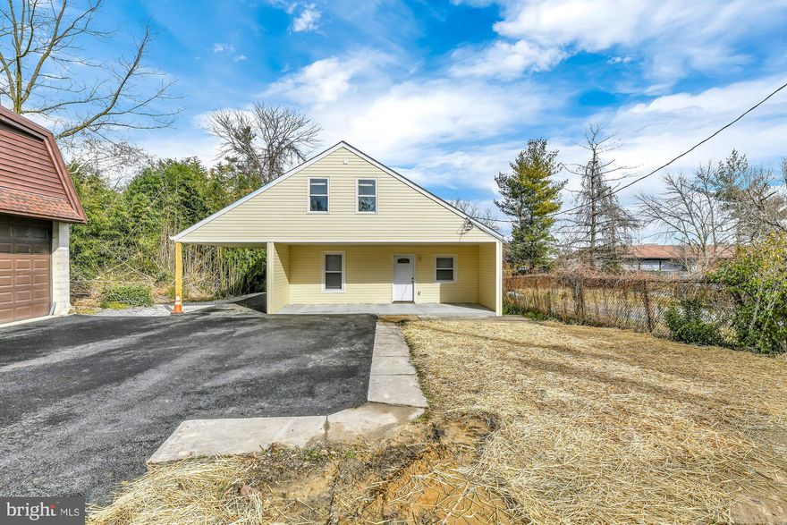 Single Family Home at a Townhome Price!! Newly renovated Single Family Home with attached two-car carport ! This home comes complete with new roof, new flooring, new HVAC System, new tankless water heater, new cabinets, new baths, new vanities, new light fixtures, new appliances, new siding & more! Take the newly paved driveway to the covered front patio and enter into your home. The floorplan is open and lives the way todays buyers demand. Inside you'll find beautiful hardwood flooring throughout the main floor. The kitchen features custom butcher block countertops, craftsman cabinets, subway tile backsplash & a stainless sink. Complete the main floor with one of three spacious bedrooms, a half bath, a first-floor laundry, and first floor family room w/ sliding doors leading to a large fenced yard . Upstairs the newly carpeted second floor features a large primary bedroom with  walk-in closet & private full bath, a sizable third bedroom, and a full bath with easy care flooring. This home is situated off the street with a long shared driveway and offers a large private parking pad for three cars at the edge of the road.  The rear yard is spacious and perfect for outdoor entertaining. Hurry this home will not last long!