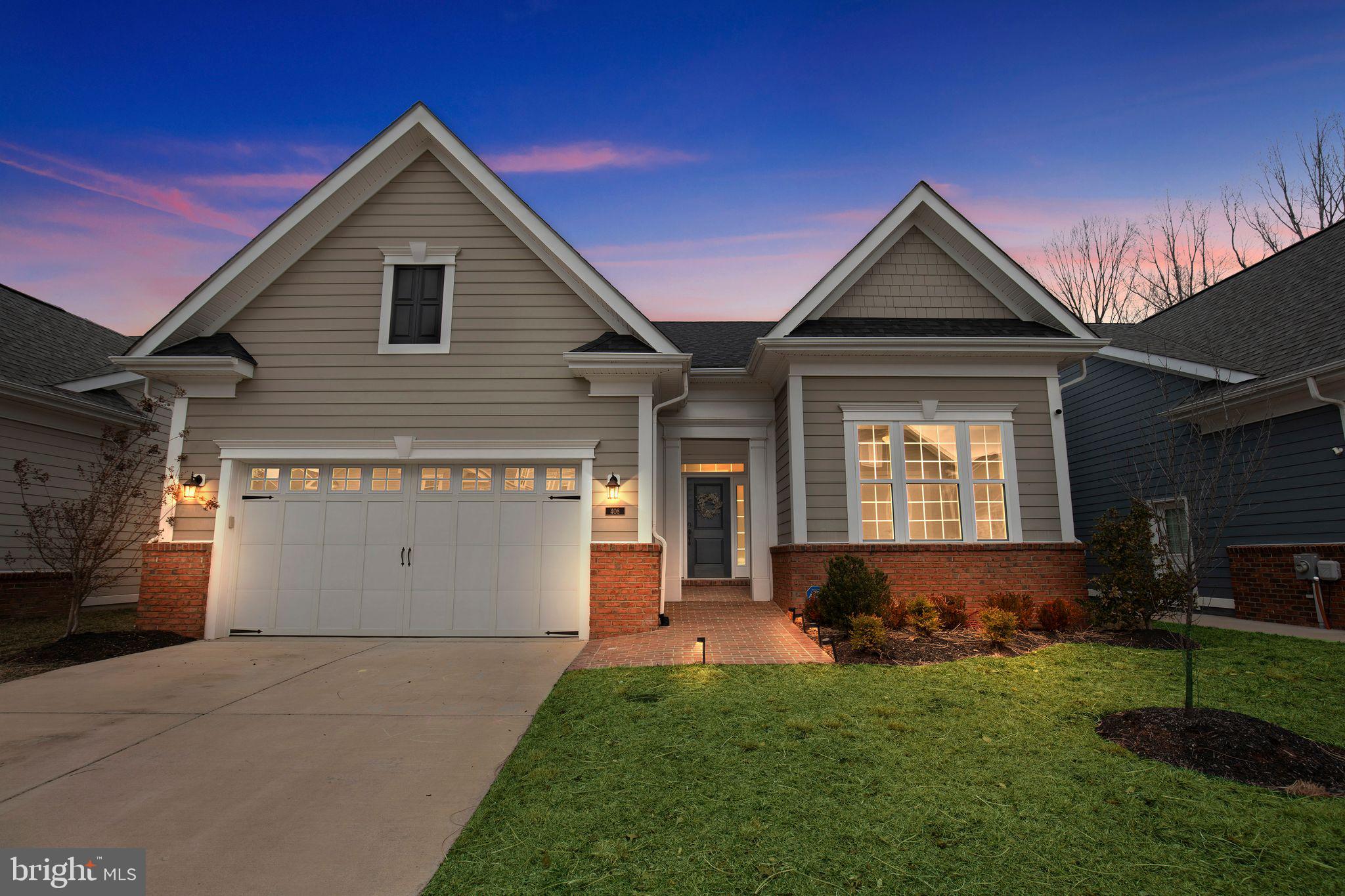 This is the one you have been waiting for! Stunning home located on a premium lot, backing to woodland in the sought after Steeplechase neighborhood. This beautiful, open floor plan home features two finished levels with over four thousand total square feet. Four bedrooms, three full baths with gorgeous, upgraded hardwood flooring. Bright and open kitchen with upgraded cabinets and appliances. French door refrigerator, 5 burner gas stove, large island, pendant lights and custom shades. Separate dining room with upgraded molding and family room with cozy gas fireplace. The primary bedroom suite is on the main level and features a huge walk-in closet with upgraded bath and tile. Maintenance free deck with quiet wooded views. Huge, finished walk-out basement and patio. Large family room, bedroom, full bathroom and giant storage room. Neighborhood amenities include pool, clubhouse, gym and walking paths. Close to shopping, restaurants, boutique shops and charming downtown La Plata MD. Conveniently located to Joint Base Andrews, Pentagon, I-495, Washington DC, and Virginia. This is a very special home and will not last long.