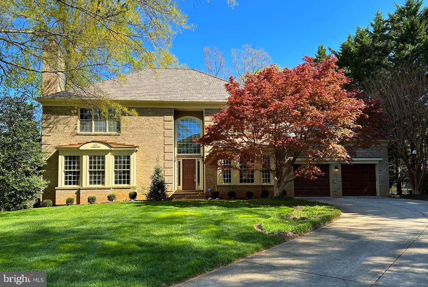 **EXQUISITE** 6-Bedroom/4.5-Bath colonial home nestled on a quiet cul-de-sac in the sought-after Solitaire community. This exceptional home, offering over 5500 sq. ft. of luxurious living space, is ideally located within the McLean High School pyramid. Step inside a grand, sun-drenched foyer, flanked by a spacious living room and a formal dining room, creating an inviting atmosphere from the moment you enter. The heart of the home is its breathtaking gourmet kitchen, complete with soaring vaulted ceilings, a large center island with a sink, top-of-the-line stainless steel appliances, a gas range, dual ovens, dual dishwashers and abundant counter spaces-perfect for preparing meals with family. A generous walk-in pantry provides ample storage for all your culinary needs. The adjacent 2-story family room is a real highlight, featuring a dramatic floor-to-ceiling stone wood-burning fireplace and expansive arched windows that flood the space with natural light. Also on the main level, you'll find a serene primary suite with one large walk-in closet-plus additional closet for added convenience. French doors open to a private deck and a beautifully appointed en-suite bath, offering the perfect retreat with a soaking bathtub, frameless walk-in shower and dual sinks. Upstairs, four spacious bedrooms await, including a Jack-and-Jill bath and a hallway bathroom. A convenient second-floor laundry room adds practicality to this thoughtfully designed home. The fully finished lower level is an entertainer’s dream, featuring a sprawling recreation room with a built-in bar and two walk-out entrances leading to a private, landscaped patio. Additional spaces include an guest suite with bathroom, media room, exercise room, private office, wine room, and ample storage—offering endless possibilities for relaxation, work, and entertainment. The backyard provides a peaceful, fenced retreat, with a large deck off the family room and a lower patio area perfect for outdoor gatherings. Updates include: Fresh paint throughout most rooms (2025), new carpet on the upper level and stairways (2025), new roof (2022), Upstairs bathrooms redone (2019), Fence and deck (2020), new washing machine (2020). Chesterbrook, Longfellow, McLean Schools!
