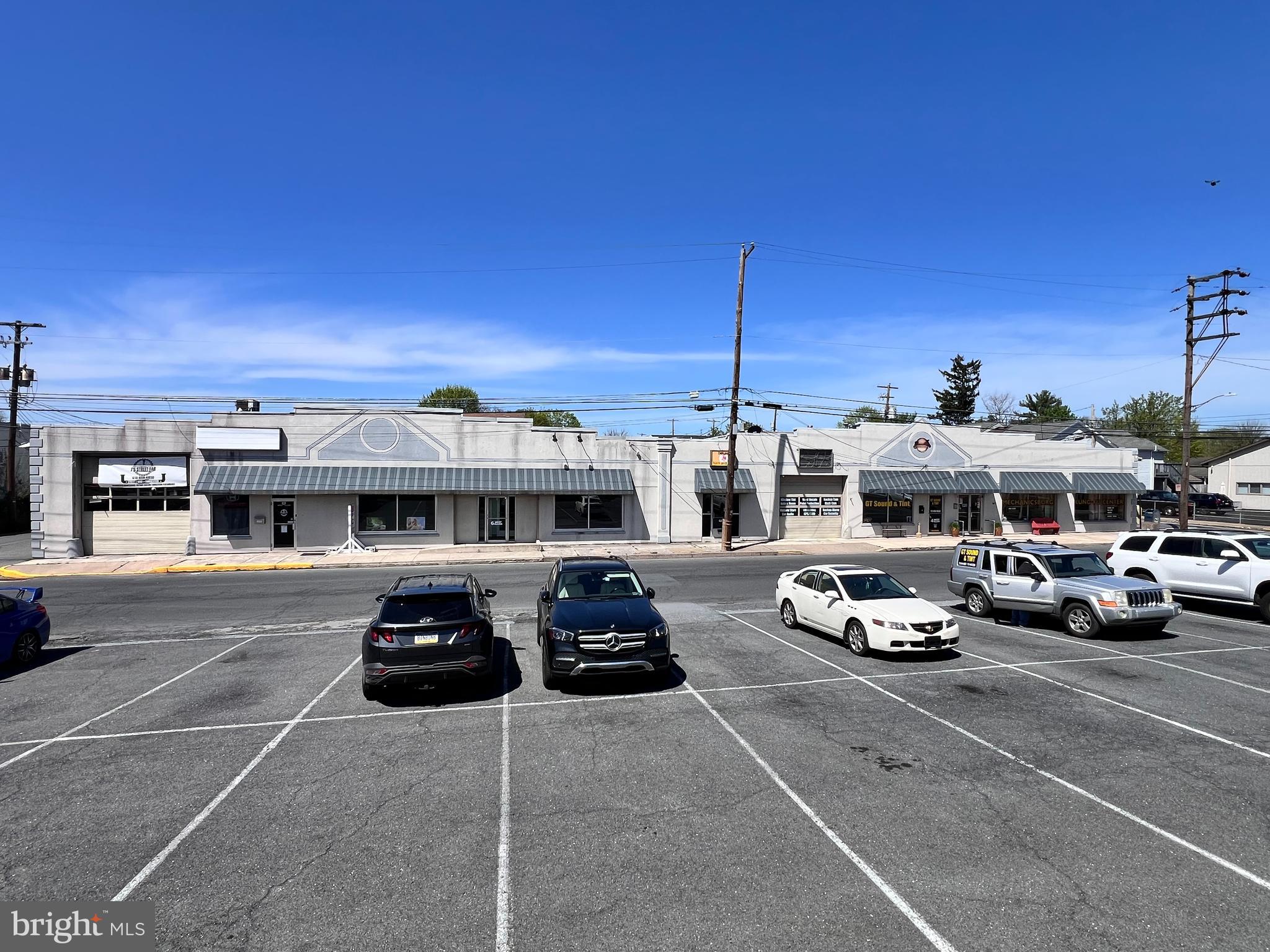 This 15,312 +/- SF building is fully leased and occupied with 6 tenants. This sale included the .20 acre parking lot across the street.