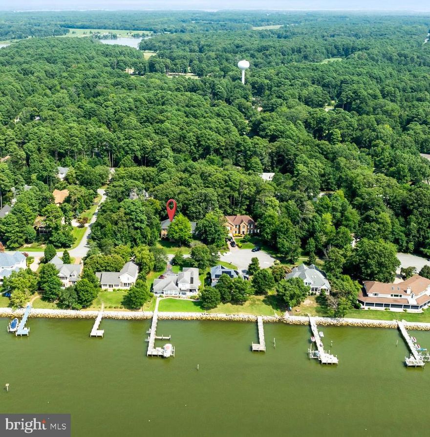 SELLER OFFERING 3% BUYER CREDIT
Experience unparalleled Potomac River living in the award-winning Swan Point Golf & Marina Community, just a short boat ride to Leonardtown and Virginia, with convenient access to Dahlgren and Lexington Park bases.
Nearly 4,000 sf  Wilkerson custom-built home sits on a private cul-de-sac with breathtaking panoramic river views from almost every window and timeless craftsmanship combined with modern comfort. Step inside to a grand staircase leading to a light-filled, open layout. The family room with fireplace flows seamlessly into a gourmet kitchen, perfect for entertaining and everyday living. Elegant spaces include a formal dining room and a gentleman’s parlor, ideal for quiet conversation, reading, or a home office.
The luxurious primary suite offers a spa-inspired bath, soaking tub, and oversized walk-in closet. Three additional bedrooms include a Jack-and-Jill setup and a private ensuite, making the home ideal for families or multigenerational living.
Notable upgrades include a new architectural shingle roof, Andersen windows, and dual geothermal HVAC systems providing energy efficiency and generating Maryland Renewable Energy Credits (GRECs). Enjoy resort-style outdoor living on the rebuilt deck with hot tub and charming bistro lighting, set within a fully irrigated yard.
The 2-car garage features new insulated doors and one bay currently configured as a year-round golf simulator, easily convertible back to traditional garage use.