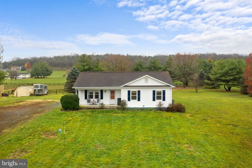 This cozy rancher in North Fork Farms has it all. Great location in a scenic neighborhood on three-acre lot. The one level 1215 sq ft. home has an open floor plan and hardwood floors. Enjoy relaxing on the deck that has direct access to  the primary bedroom.  Location offers a convenient commute to Harrisonburg, Winchester or Northern Va. Enjoy fishing and canoeing with neighborhood access to the Shenandoah River or explore the nearby national forest. Homes in North Fork Farms seldom come on the market so this is a must see.