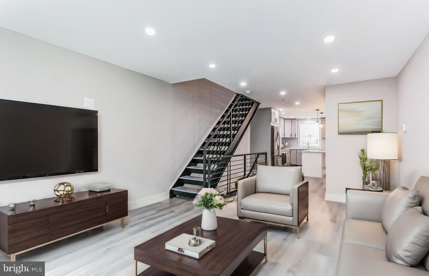 Welcome to 363 Durfor Street – Another stunning renovation by Tristate Properties, a fabulous boutique Philadelphia builder with unbelievable attention to detail. This modern tastefully done and spacious 2 story, 2-bedroom, 1.5 bath home is a true wow with its open floor plan, high ceilings, massive amounts of natural light, wide plank flooring plus an absolutely gorgeous kitchen and bath.  This home was totally stripped down to the studs and completely rebuilt including the entire rear of the property.
1st floor - Walking up to this beautiful home you will notice its original marble façade and steps introducing you to the first level - WOW.  Expansive living room/dining room with 3 windows across allowing wonderful amounts of southern exposure and luxury handsome wide plank flooring.  The living/dining area flows directly into a stunning Chef’s kitchen with 42 inch upgraded dovetail box construction cabinetry, striking Calacatta classic quartz countertops with mosaic glass backsplash.  Handsome Frigidaire Galley series stainless steel appliances plus an expansive quartz breakfast island with designer lighting above and cabinets below.  Just off the kitchen area is a sizable powder room and a wonderful private outdoor area with new fencing.  2nd level - Custom staircase with a wrought iron open concept and modern linear railings introduce you to this level where you will find 2 unbelievable sized bedrooms both with great light, high ceilings, plank flooring and sizable closets.  Spacious hall closet and a striking spa bath with a 70-inch quartz vanity with double sink, handsome fixtures and designer lighting. 
Lower Level – Great flexible space.  Neat and clean with high ceilings, washer/dryer, mechanicals and storage.   Who will be the new lucky owner of this gorgeous home on a wonderful block?  Schedule your appointment today. Easy to show.