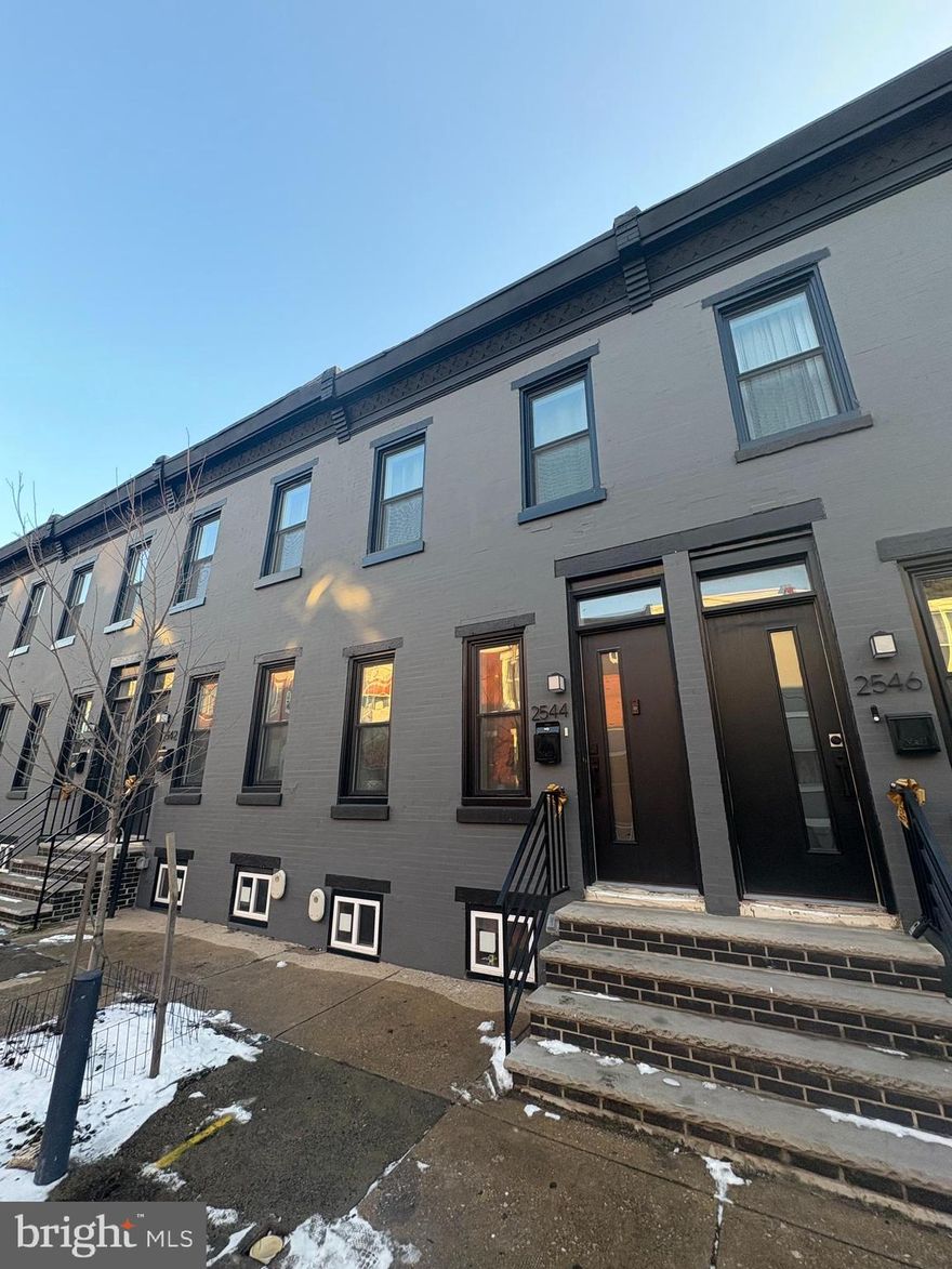 Located in the highly desirable Brewerytown neighborhood near Fairmount Park, Kelly Drive and numerous new construction projects, this gorgeous home has 2 bedroom 2.5 bathroom fully renovated rowhome! Enter to a spacious living area with tiled foyer and oak flooring which flows from the living room, through the dining area, and into the kitchen. The kitchen is equipped with new stainless steel appliances, shaker cabinets, and quartz countertops. Laundry and half bath placed conveniently on the main level. Upstairs are two bedrooms and two full bathrooms. The primary bathroom has a spacious walk-in shower and light up LED mirrors. The unfinished basement provides ample storage space. Outside you’ll find a fenced in backyard with concrete patio for entertaining and grassy area for pets. The Brewerytown neighborhood features a perfect mix of green and urban living. This neighborhood is very close to attractions like the famous Philadelphia Art Museum, the Barnes Foundation, and several other arts destinations. Other nearby scenic attractions include Fairmount Park, Boathouse Row, Kelly Drive and West River Drive. Locals frequent Fairmount Avenue for neighborhood bars, restaurants, weekly farmers markets, and coffee shops. Lease Terms: Generally, 1st month, and 1-month security deposit due at, or prior to, lease signing. Other terms may be required by Landlord such as last month's rent upfront.