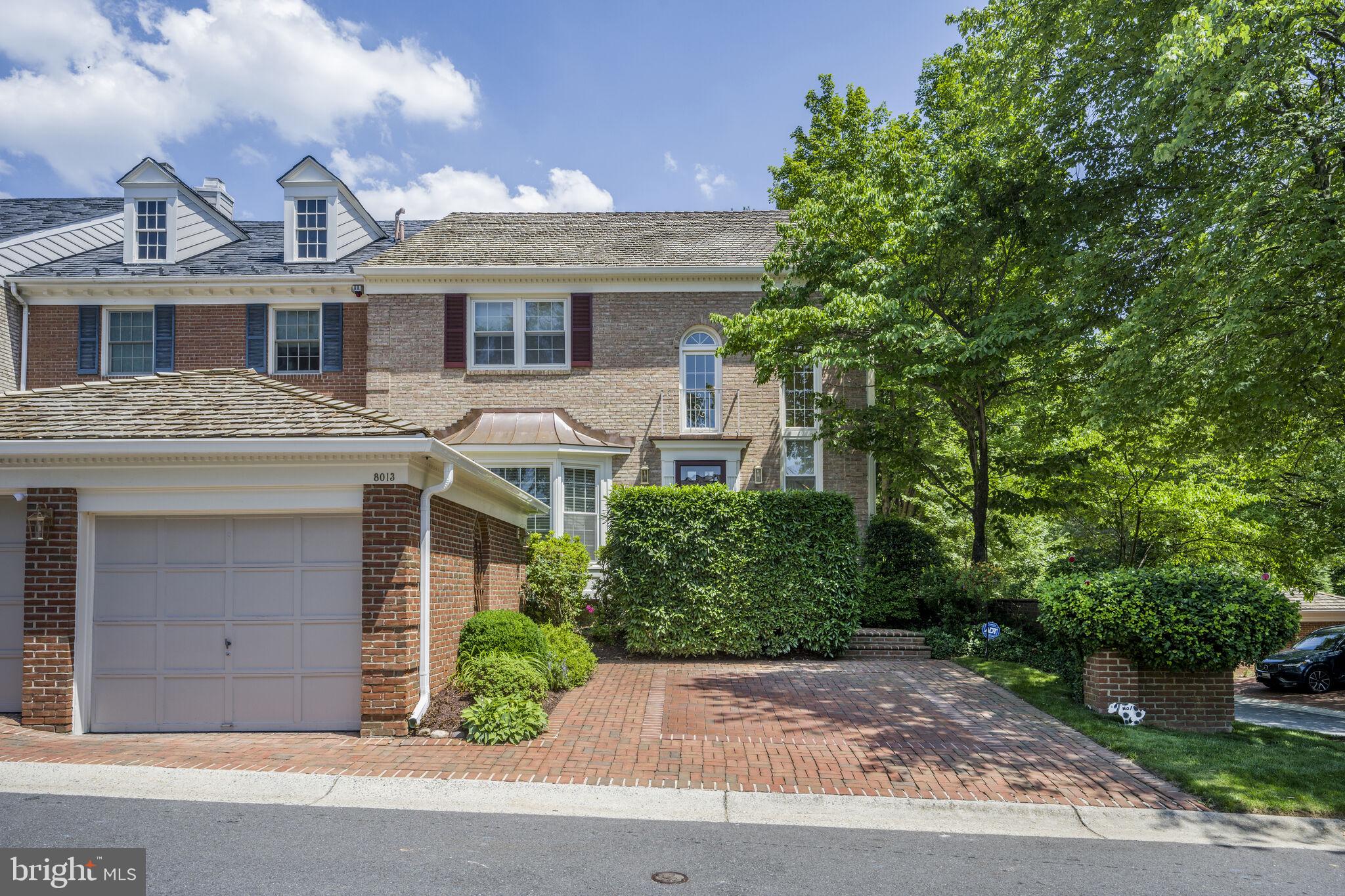 Welcome to this beautifully maintained brick colonial end-unit townhome, located in the sought-after Riverhill community of Bethesda. Thoughtfully updated, this spacious 3-bedroom, 3.5-bath home has over 3,500 sq. ft. of living space on 3 levels and combines timeless elegance with modern convenience.
Step inside to a dramatic two-story foyer and elegant curved staircase, setting the tone for the home's refined charm. The main level offers hardwood floors, crown molding, and an open living and dining area, perfect for entertaining. A private study with custom built-ins provides a quiet workspace, while the updated kitchen features a large island, breakfast area, and flows seamlessly into the family room with a cozy fireplace.
Enjoy indoor-outdoor living with a Trex deck, retractable awning, and spiral staircase leading down to a private brick patio—a perfect space to relax or host guests.
Upstairs, the expanded primary suite is a true retreat, complete with an oversized dressing area, custom closet system, two walk-in closets, and a spa-like bath featuring a soaking tub and walk-in shower. The upper-level laundry room adds convenience.
The finished lower level is filled with natural light and includes a bedroom, full bath, stone fireplace, bar area, and walkout access—ideal for guests or entertaining.
Additional highlights include:
- New roof & HVAC
- Updated windows and treatments
- 1 car garage + driveway parking for 2
- Low-maintenance living with a reasonable fee
With its abundant natural light, thoughtful updates, and prime location, this home is a rare find.
3D Tour and Floor-plans available in the property site.
Contact listing agent for a private showing.