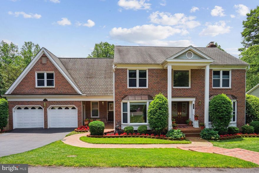 Welcome to Tysons Creek, a small enclave of nine single-family homes, each nestled on generous private lots. Situated just off the newly expanded Route 7, this community offers easy access to Wolf Trap National Park for the Performing Arts, Metro’s Spring Hill Station, as well as a variety of shops and restaurants, all within walking distance. This beautifully updated and expanded home, backing onto scenic parkland, provides approximately 5,545 square feet of finished living space. It features 5 bedrooms, 4.5 baths, and stunning grounds that include lush gardens with incredible rose bushes, expansive lawns, a deck, a patio, The interior boasts gorgeous hardwood floors, intricate moldings, and two wood-burning fireplaces. Highlights of the home include a magnificent two-level addition, a spacious gourmet kitchen with an island, a second staircase to the upper level, and a walkout lower level. The property also offers an oversized two-car garage  with custom finishes and a separate courtyard entrance at the front of the home. Ideally located, this home is just 2 minutes from Tysons Corner, 10 minutes from downtown McLean, 15 minutes from Washington Dulles International Airport, and conveniently accessible to all major commuter routes in the Capital Region. This home is nearly perfect in every way!