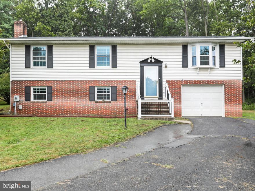 This home is under contract with home sale contingency. 72 hour kick-out!

🏡 Welcome to 34 Cabell Court, Inwood, WV — Your Dream Home Awaits!

Tucked away at the end of a peaceful cul-de-sac in the charming Sylvan Grove neighborhood, this  4-bedroom, 3-bathroom gem offers the perfect blend of comfort, style, and space.

✨ Property Highlights:

• Spacious 2,610 sq ft split-foyer layout with traditional charm
• Gourmet kitchen featuring stainless steel appliances, granite countertops, and a stunning backsplash
• Two Primary suites for ultimate privacy and convenience
• Fully finished basement with a cozy brick fireplace and woodstove insert
• Hardwood floors and elegant crown moldings throughout
• Large enclosed porch and deck — ideal for entertaining or relaxing
• Attached garage with workshop and extra storage
• Beautiful 0.25-acre lot backing to trees 

Whether you’re hosting family gatherings in the oversized dining room or enjoying quiet evenings on the enclosed back porch. Plus, with a low annual HOA fee and proximity to Berkeley County Schools, it’s as practical as it is picturesque.

📍 Location Perks 
• Easy access to commuter routes, shopping, and dining

Don’t miss your chance to own this standout property in Inwood. Schedule your tour today and experience the warmth and elegance of 34 Cabell Court!