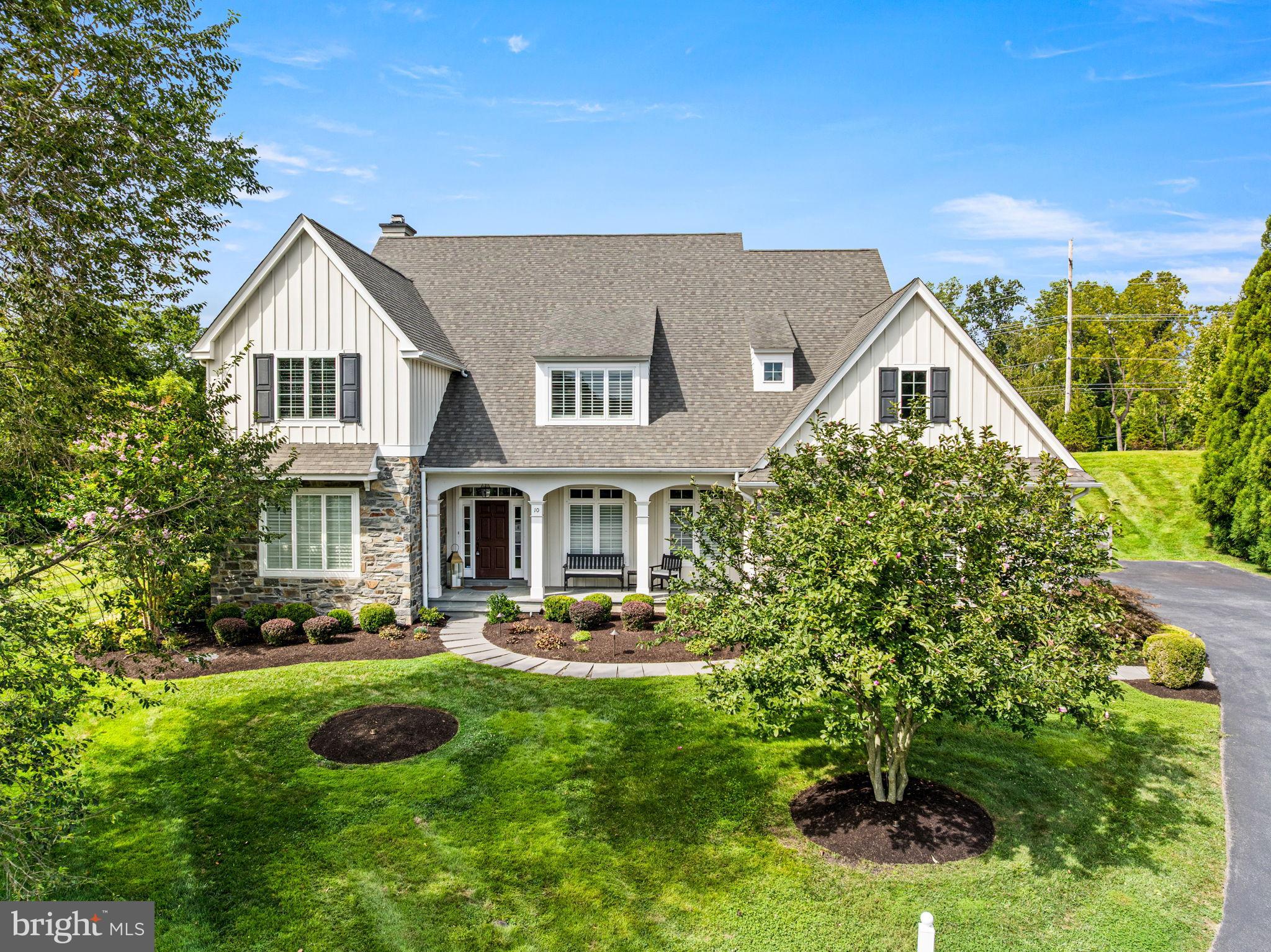 Welcome to 10 Hadley Lane, a stunning 5-bedroom, 3.5-bath custom Vaughan & Sautter built home in the desirable Andover neighborhood and highly rated West Chester School District. Situated on over a third of an acre at the end of a cul-de-sac, this home offers a traditional yet open floor plan. The inviting foyer features wide plank hardwoods, newer carpets, wainscoting, crown molding, coffered ceilings, and plantation shutters. The family room, centered around a fireplace with built-ins, flows seamlessly into the gourmet kitchen with granite counters, large island, Viking 6-burner stove, Bosch appliances, and Subzero refrigerator. A breakfast room with an immense amount of natural light overlooks the deck and backyard, while a butler’s pantry connects the kitchen to the formal dining room. The first floor also includes a powder room, living room, private office, conversation room, and mudroom with access to the 3-car garage. Upstairs, the luxurious primary suite offers a sitting area, tray ceilings, his-and-hers walk-in closets, and spa-like bath with soaking tub and walk-in shower. A second bedroom with en-suite bath, three more bedrooms, and laundry room complete the upper level. The finished lower level has a fully finished gym/workout room, a private finished office/gaming room, plus additional storage space! Additional upgrades include a whole-home 22kw generator, Culligan Smart HE whole house water treatment system, whole home audio system, upgraded outdoor lighting, two separate dual-zoned HVAC systems, recently installed irrigation system, whole home alarm system and so much more! All located just minutes from Downtown West Chester, Ridley Creek State Park and Downtown Media and several major roadways.