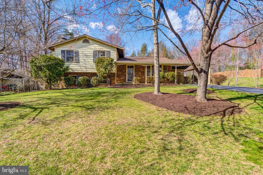 This property boasts a brand new remodel by Design Pro, featuring an open-concept kitchen that flows into the living area. It includes all-new cabinetry, stainless steel appliances, quartz countertops, and a stylish floating range hood. A coffee bar with quartz counters and additional cabinetry has also been incorporated. The entire home has new flooring.  The primary bath has been completely remodeled  and an updated hall bathroom . An additional full bath has been added to the lower level. The home has been freshly painted throughout, with new stairs and railings as well. There’s a new roof that comes with a transferable 50-year warranty and a brand-new electrical panel. The annual HOA dues are minimal, and the location offers easy access to VRE, the metro, and major roadways. It's conveniently situated near George Mason University, University Mall, as well as various restaurants and shopping options, and is within the desired Robinson school district