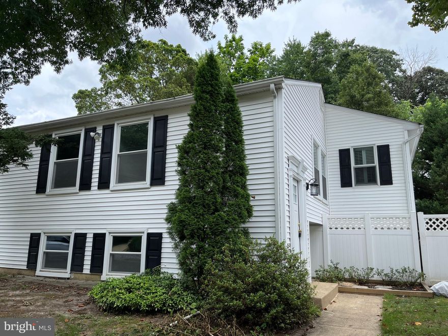 Must see!! Stunning town home with unique floor plan!!  Main level dining room complemented by beautiful hardwood floors, a huge kitchen with stainless steel appliances, white cabinets, built-ins in both the kitchen and family room.  Plus don't miss the fabulous  family room addition with plantation shutters, and a dramatic brick  gas fireplace to enjoy on a cozy winter night, leading to a delightful sun room to enjoy your morning coffee or relax with a good book.  The master bath has a separate shower and tub and a large walk in closet!  The home has fresh paint and new carpet too!   The lower level has 2 additional bedrooms and full bath, storage and laundry room.  Conveniently located off Rt 2 & Rt 50 for easy access to Baltimore, Annapolis and D.C.  Take time to explore this lovely home and imagine the lifestyle available to the new owner!! Hurry won't last!!