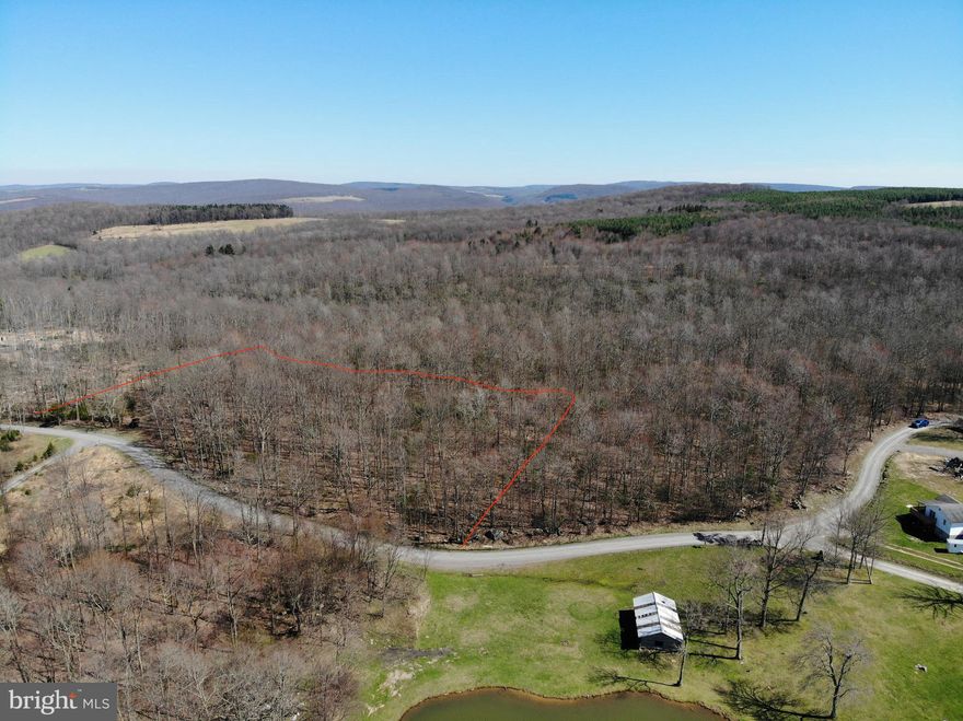 Welcome to this little slice of heaven ... literally, this 3.7 acre +/- wooded lot located in Friendsville bordering West Virginia is an absolute beautiful piece of land. The property has great road frontage, is level throughout, and greets you with a lovely hardwood forest mixed with evergreens and rhododendrons. This land is perfect for any outdoor recreational activity including hunting, camping, hiking, or just make it the perfect mountain retreat. Property had a perc test on it, but it is since expired so new testing would probably be required. Imagine building your dream home with mountain views, and just a quick trip down to Deep Creek Lake. So many opportunities come with this land, you would think it's much bigger. With no zoning restrictions, Dream big on a smaller budget with this one, schedule your private tour today!