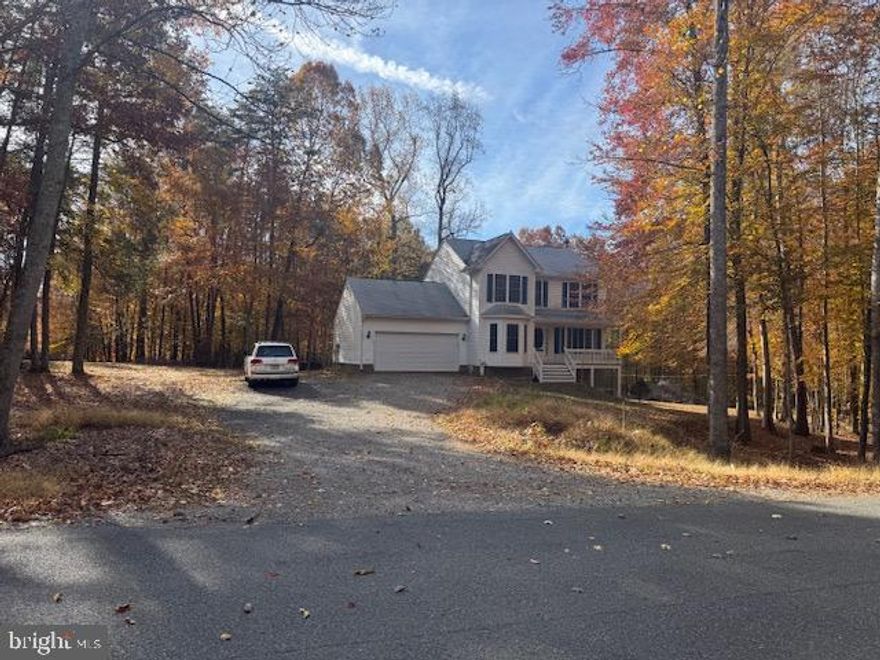 Stunning setting with beautiful colonial on private 6 acre lot. Lots feature established trails and views of Fishing Run. Close to public access for Rapidan River as well. Home is an open concept colonial with a large deck that overlooks huge cleared yard. HVAC is 2024 and Water Heater 2022. New Roof installed November 2025.  This home has unlimited potential and is awaiting your personal touches!