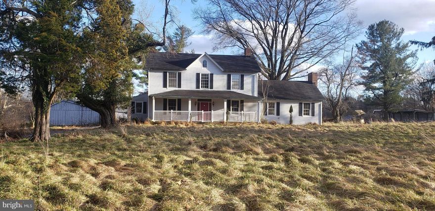 A gated, tree lined driveway leads to this charming  restored farmhouse.  Property includes 9.4 Acres, front porch, hardwood floors, built-in book cases, large country kitchen w/ island, farmhouse sink, Dutch door out to the brick covered patio, pasture and pond view  & your own park like setting.   Updates include replacement windows, central A/C  & a whole house generator.  Exterior includes a large center aisle barn, outdoor riding ring, indoor covered arena & multiple paddocks.  Working 14 stall barn and 50 ft enclosed round pen makes this a treasure, extra large shop & garage with two  offices. This is a Bank Owned Property.