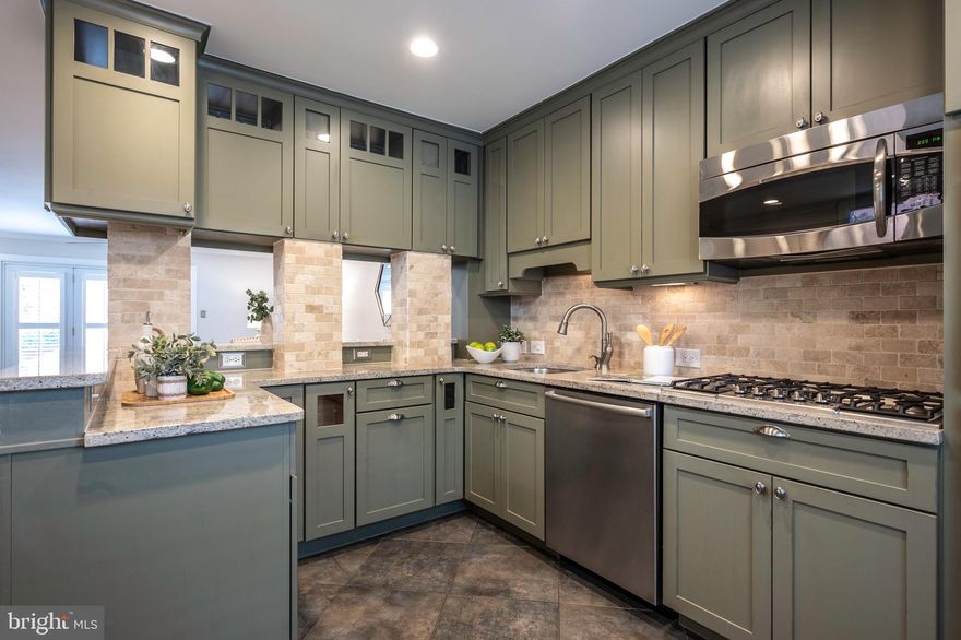 OFFER DEADLINE: KINDLY HAVE OFFERS IN BY 12:00 PM  TUESDAY, JULY 30. 1431 Oronoco Street is a move-in ready home that greets you with a classic Old Town style exterior. Inside it’s a more modern vibe, with gorgeous custom wood-inlaid tile floor in the entry foyer leading to a large closet that provides all the space you need for your seasonal items. 
 
The elegant, renovated (2014) kitchen offers a more modern, open concept than you’ll normally find in Old Town, with granite counters, endless cabinet space, stainless steel appliances (GE Profile double oven with convection option on upper oven; 2024 Samsung French door, bottom-freezer refrigerator, Bosch five-burner gas range and dishwasher) and tile backsplash and floor. This is the only property in Colecroft with gas! Gas cooking, fireplace, heating and hot water. 
 
The modern, open living/dining area, with ceiling fan, cozy gas fireplace (with remote), windows with plantation shutters on two sides, Brazilian cherry floors, and door leading to charming brick patio with privacy fence, is a great space for indoor/outdoor entertaining, relaxing, or spending quality time. Enjoy recessed lighting throughout the home, and crown molding throughout main and upper levels.

The upper level has 2 bedrooms and 2 full bathrooms. The primary bedroom offers 2 closets with lighting and Elfa adjustable closet systems, top down/bottom up blackout Bali Blinds, and ensuite; both upper level bedrooms have recently refinished hardwood floors, ceiling fans and crown molding.

Perfect for working from home or an amazing retreat for study, play and/or homework, the lower-level space offers recessed lighting, built-in speakers, and a gorgeous work desk with an entire wall of built-in shelves and cabinetry, and a full bathroom.

The utility room has 4-year-old Samsung large capacity washer and dryer, a utility sink, and a continuation of this home’s incredible storage space: upper and lower cabinets with counter space, a wall of shelves, and shelved, under stair storage. 

The attic provides additional storage space with pull-down stairs, partial flooring and shelving. 

The assigned parking space is, conveniently, immediately outside the patio. 1 visitor pass is also provided.

The HOA provides the landscaping and maintenance for the front and side yards. 

This well-maintained, professionally cleaned, freshly painted throughout, end unit townhome with only 1 shared side is ready for you to move in!

Colecroft is adjacent to the Braddock Road metro station (blue and yellow lines) and blocks to King Street metro and Amtrak/Virginia Railway Express stations, as well as the shops, restaurants and community life of Del Ray, Old Town and the Alexandria waterfront, including a Trader Joe’s and Whole Foods (both with free underground parking). Walk Score of 90 and Bike Score of 87! Approximately 4 miles (or 2 metro stops!) to Ronald Reagan Washington National Airport. Short drive to local commuting routes: the Beltway, George Washington Parkway, Duke Street, Rt. 1, Telegraph Road, and King Street. 5–6-mile drive (or 5 metro stops!) to the Pentagon. 6 metro stops to Washington DC.