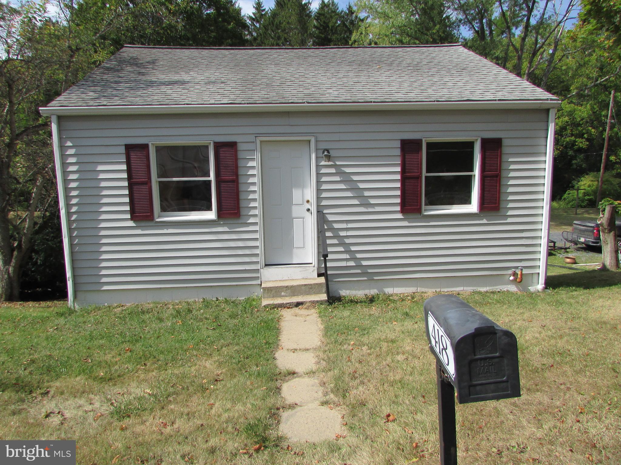 This adorable ranch with a walkout lower level is located in the charming village of Lemont. Don't let the size of this home full you! The layout allows this home to feel much larger then it appears. When entering the main level, the new flooring shines, the vaulted ceiling in the living room allows for lots of natural light, there is a full bathroom, great kitchen, and a bedroom. Right off the dining area is sliding glass doors leading to your 12'x26' deck. Enjoy relaxing on your deck which over looks the beautiful, and peaceful Spring Creek (your backyard goes right to the creek). Make your way down the steps to the lower level where you will find 2 additional bedrooms, a convenient full bathroom, and a large foyer. There is plenty of storage under the deck, and a small shed. Keep this gem as an income producing property, or make it your home! This property has a rental permit, and it has been rented in the past for $1,150.00 monthly. Perfect location only 2.5 miles from Beaver Stadium!
Please note that the back roof is scheduled to replaced on or before 11/30/2025.