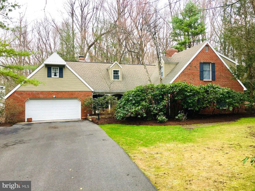 A home for all seasons, and a true delight for nature lovers. Enjoy the views from the Sunroom/Eating area during each changing season. This home is situated in an ideal location only minutes away from restaurants, shopping and PSU. This beautiful brick siding home is located in the State College Area school district. Features include a formal dining room, living room, and large family room. Cozy and warm as you snuggle up to your choice of two fireplaces on the main floor. Full bath and guests suite, lovely deck off the family room. Kitchen with breakfast nook/sunroom will become your favorite place to sit and relax and take in all the views. Convenient first floor laundry. Owner's suite has a new walk in shower and a dry heat sauna. Just off this bedroom find an adjacent office, lounge, nursery or hobby room, fitted with a wood burning stove and bookshelves. Looking for more? This house has it..... finished basement featuring bookshelves along with a custom built in bar for entertaining and more. Hobby area, game room something for everyone. Total of 4 bedrooms and 3 baths. 1.04 acre lot in a neighborhood of all custom homes. Located on a tree lined street ending in a Cul-De-Sac. This home is ready for its new owner.