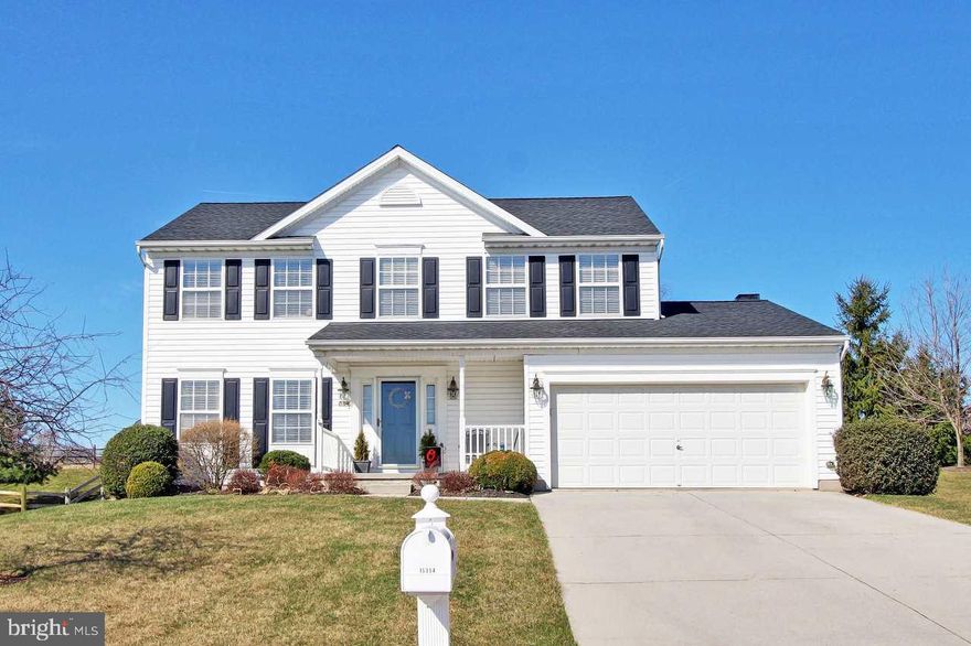 This 4 BR/4 bath well maintained home w/updated counters,backsplash, SS appliances, updated baths,new roof and HW floors.Open floor plan includes wood burning fireplace in FR off kitchen that also leads to the new composite deck. Sit on the deck and enjoy the private backyard that overlooks fields.Basement is finished with wet bar and entertainment area.