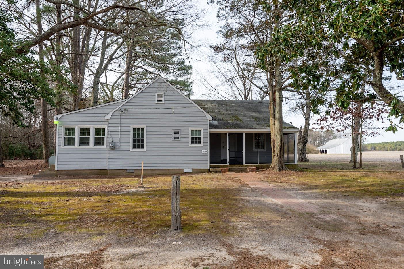 Country setting. One of 3 rental properties on this property. Other 2 properties recently rented. Current lead certificate. Original hardwood floors. Screened in porch. No air conditioning. Needs window units. Oil heat. Windows have been replaced. New lock on front door. Storage shed.