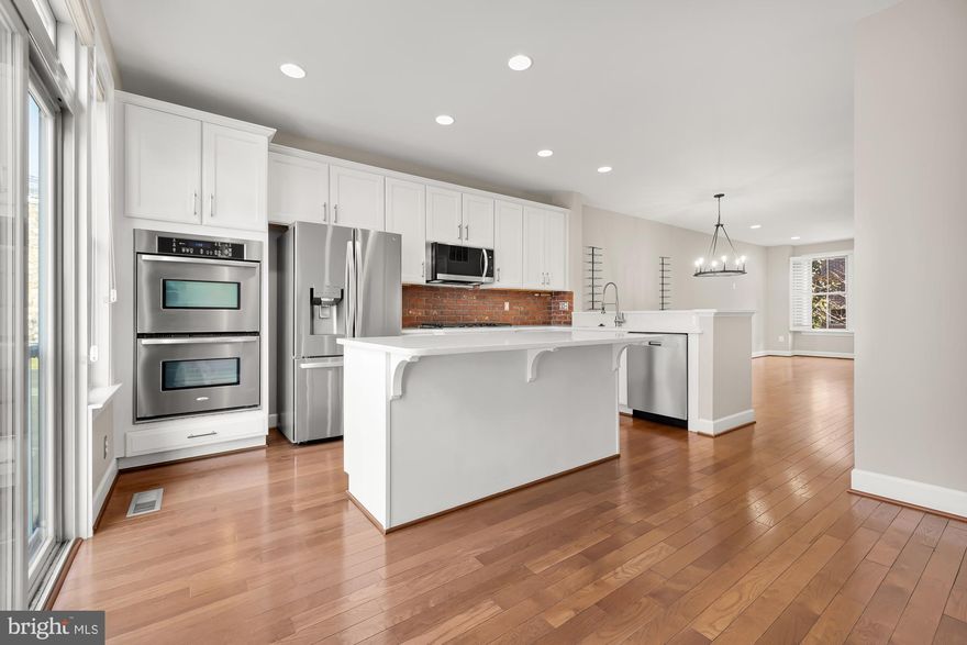 Meticulous, Updated townhome, with chef's kitchen, gleaming hardwood floors throughout, 2-car garage parking and private roof deck. Gourmet kitchen features double ovens, crisp white quartz countertops, stainless steel appliances, sizable island and opportunity for eat-in table.  Open floor plans blends dining and living room seamlessly. The upper level is equally stunning, with a fantastic primary suite and completely renovated ensuite bathroom.  The secondary bedroom and bathroom are equally luxe, stylishly renovated as well, and a washer/dryer is conveniently located on this level.    Relax and unwind as you head up to your private roof deck!  Additional storage space in the garage.  This home is professionally managed by Peake Management Inc. for your ease.  Pets allowed!

Conveniently located steps away from Shirlington Villages with shopping, boutiques, theatres, award-winning restaurants and more.  Easy access to I-395, Crystal City, also convenient drive to downtown Washington DC, Reagan Airport & Pentagon City METRO Station.  WO&D trail & Four Mile Run dog park steps away.  Close to Old Town Alexandria, the Pentagon, Clarendon, Ballston & Rosslyn.