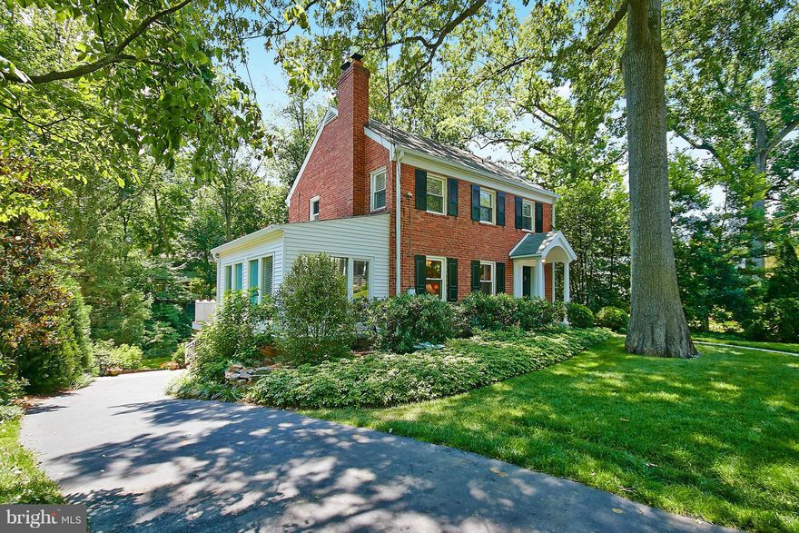 Beautiful St rare spectacular lot bordering tranquil creek  house says...WELCOME HOME! Solid 1940 Col crown molding sparkling hdwd flrs  hi end chef's kitchen Induction range/convection oven SPA baths  Fresh paint  move in READY! Center stage is a large screen porch overlooking a most amazing yard professionally landscaped private hot tub 5 zone irrigation system STUNNING!! Generator ready!
