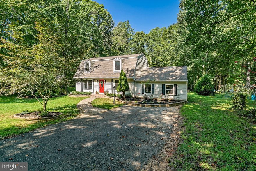 A PLACE WITH SPACE & THE GREEN, GREEN GRASS OF HOME.  The feeling of privacy yet perfectly situated to all the local amenities! Upon entering this home, immediate attention is drawn to the warm and relaxed feel. The floor plan encompasses three bedrooms, two full bathrooms, formal living room, dining space, kitchen and a spacious family room nestled on an acre of land. Laminated flooring throughout for easy maintenance! The kitchen has been remodeled with granite counter-tops, updated appliances, both bathrooms have been remodeled. Enjoy barbecues on the patio overlooking your canopy of beautiful trees! Be prepared to fall in love! Some notable qualities: *10 windows and siding replaced in 2005 *HVAC in 2014 *Roof replaced in 2006 *Kitchen remodeled *Crawl space  improved by seal tite in 2017 *Well pump and pressure tank replaced in 2019