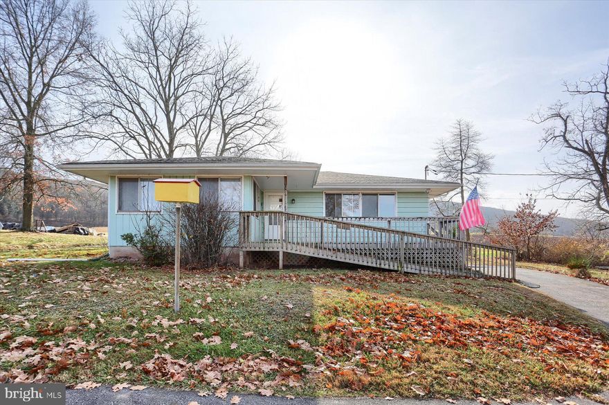 Ranch home on large lot in Halifax! Home features 1,200 sq. ft., 3 bedrooms (1 is currently used as a laundry room with washer & dryer hook ups, both included), hardwood floors, updated eat-in kitchen with pantry and all appliances included, full walkout basement. Beautiful views behind and across the street from this one! Separate brick building was once a schoolhouse and then was at one time the main residence. Enjoy no utility bills for well water and septic. Home is heated by oil. The sale of this property includes 3 parcels, adding up to the 1.12 acre lot! Located just a short country drive from Harrisburg, PA! Home is being sold AS IS.