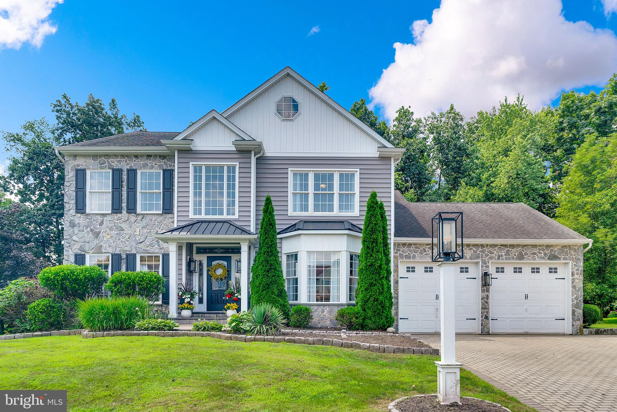 Don’t miss this exceptional 5-bedroom, 3.5-bath colonial in the highly sought-after Cassel Mill neighborhood of scenic Skippack Township. From the moment you arrive, you’ll be struck by the home’s impressive curb appeal, featuring an oversized paver driveway, brand-new vinyl siding, and a welcoming covered entrance. Inside, the main level showcases a beautifully upgraded kitchen with white cabinetry, granite countertops, tile backsplash and flooring, stainless steel appliances, a double oven, upgraded lighting, and a center island. The kitchen opens to a stunning four-season sunroom with floor-to-ceiling windows, tile flooring, and sliding doors that lead to a truly spectacular outdoor living space. The kitchen flows into a spacious family room highlighted by engineered hardwood floors, detailed trim work, recessed lighting, a stone raised-hearth wood-burning fireplace, and ample space for your large-screen TV. Also on the main floor is a formal dining room with tile floors, crown molding, and wainscoting, plus a bright home office featuring hardwood floors, floor-to-ceiling windows, and recessed lighting. Upstairs, you'll find three generously sized guest bedrooms with hardwood floors and an updated hall bath with double vanities, granite counters, and custom tile work. The primary suite is a true retreat with walk-in closets and a beautifully renovated en-suite bath featuring an oversized walk-in tile shower, dual vanities, tile floors, and a vaulted ceiling. The finished third level offers a large fifth bedroom with separate zoned HVAC—perfect as a bedroom, playroom, or gym. The fully finished basement is built for entertaining, featuring engineered wood flooring, a media area, game room with a pool table and built-in brick pizza oven, a full custom bar, and a third full bathroom. Step outside to an incredible backyard oasis that includes a covered patio with a granite-topped bar (seating for 8), recessed lighting, outdoor heaters, and a separate sitting area. A second composite deck off the sunroom leads to a fenced-in yard that backs to open common space—an area enjoyed by the current owners for years. The oversized two-car garage offers 10' x 9' doors, is fully heated, and includes a staircase to a second-level storage room or workshop. Recent updates include: new siding, gutters, downspouts, fresh paint, and new HVAC systems.
Location perks: Just one minute from Evansburg State Park with hiking, fishing, biking, golf and equestrian trails, and only five minutes from Historic Skippack Village with boutique shopping, award-winning restaurants, live music, and a rich cultural scene.