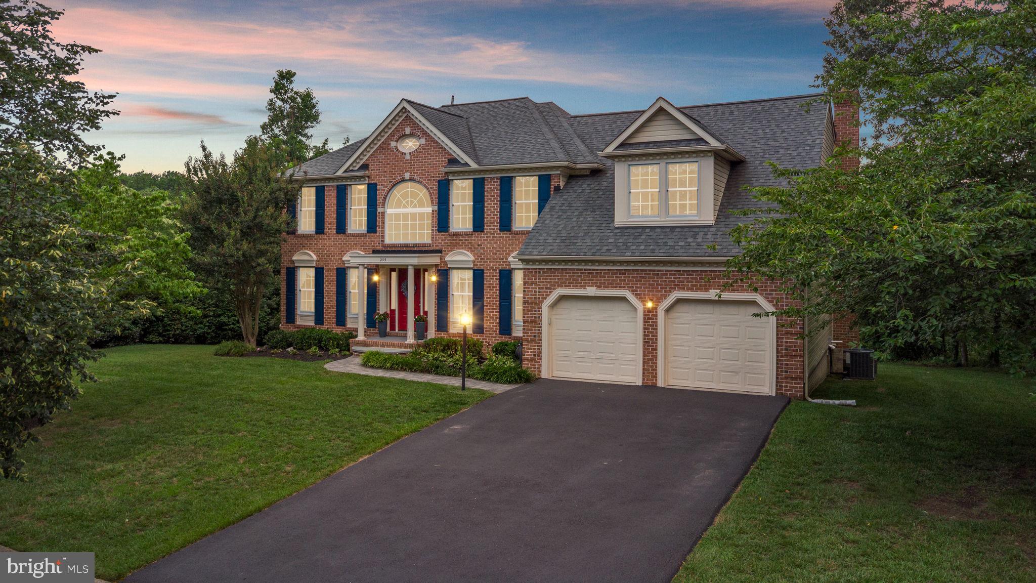 Introduced to the market for the first time by the original owners, this timeless brick-front Colonial offers a rare opportunity in the Brittingham neighborhood. Thoughtfully constructed by Landmark Homes, a well respected local builder, this home showcases quality craftsmanship and enduring appeal. Just minutes to Kinder Farm Park, residents enjoy direct access via neighborhood trails, making it easy to explore nature the 288-acre park that offers a variety of natural and recreational activities at the park right from your doorstep. Situated on just under a half acre landscaped lot, this impressive property abuts a tranquil, county-stocked, catch and release pond surrounded by towering trees—offering both privacy and peaceful natural views. Stepping inside the home, you're welcomed by a two-story foyer flooded with natural light and hardwood floors that extend into the main level office/study/bedroom complete with double doors for privacy.. The formal living and dining rooms offer classic elegance, ideal for both everyday living and special occasions. The kitchen features granite countertops, stainless steel appliances, and a sunlit breakfast nook that provides access to the multi-level deck and views of the landscape and pond beyond. Just off the kitchen, the inviting family room centers around a wood burning fireplace with a classic brick hearth, creating a warm and comfortable gathering space. Conveniently located on this level is a half bath and a laundry/mudroom area with direct access to the attached garage. Upstairs, you'll find three generously sized secondary bedrooms and a full hall bath with a tub/shower combination—perfect for family or guests. The highlight of the upper level is the expansive owner's suite, featuring vaulted ceilings and a truly impressive sitting area that offers the perfect space to unwind or create a private retreat. A custom, extended walk-in closet provides ample storage, while the luxurious en-suite bath includes a corner soaking tub, a separate glass-enclosed shower with frameless doors, and a double sink vanity—combining function with spa-like comfort. The walk-out lower level offers even more living space, featuring a fully carpeted recreation room perfect for movie nights, play, or entertaining. A separate finished room provides flexible space for a guest bedroom, home gym, hobby area, or office. A full bath adds convenience, while a dedicated storage and utility area helps keep everything organized and out of sight. Upgrades and features include newer roof, new furnace, 2 zone HVAC. Zoned for Severna Park School district, with easy access to major commuter routes, making travel to Annapolis, Baltimore, or Washington, D.C. a breeze. Plus, you’re just minutes from the heart of charming Severna Park—a vibrant community known for its locally owned restaurants, cafes, and boutique shopping.