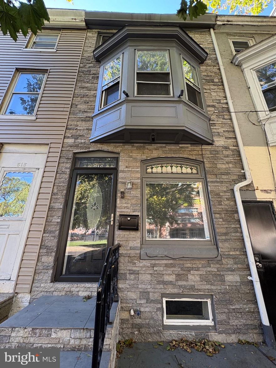 This charming 4-bedroom, 1-bathroom townhouse in the desirable Reading neighborhood offers a perfect blend of traditional style and modern convenience. Built in 1900, the home features a warm, inviting atmosphere.The kitchen is equipped with essential appliances, including a stove, microwave, washer, and dryer, making daily chores a breeze. Enjoy the comfort of a full basement, providing storage space or any other potential dream.