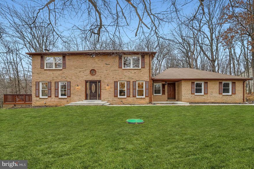 Back on the market because of buyer's financing. Nothing is wrong with the house.
Better than new! This beautifully updated home in the desirable Valley Hills neighborhood offers over 5,000 sq. ft. of living space and features a modern, open-concept design throughout.
A grand two-story foyer welcomes you with elegant crown molding and a stunning staircase leading to the upper level. The new gourmet kitchen boasts 42" cabinets, a large center island, quartz countertops, and sleek black stainless steel appliances. The expansive family room includes a fireplace and two sliding doors opening to the deck, while the separate living room, also with its own fireplace, offers an additional set of sliders to the deck—perfect for indoor–outdoor living.
The main floor features a highly convenient bedroom with a full bath, ideal for a mother-in-law suite, guest suite, or private flat, as it can be easily separated from the main living area.
Upstairs, the primary bedroom suite includes an updated bathroom, fireplace, and walk-in closet. Three additional spacious bedrooms and a full hall bath complete the upper level.
The fully finished basement provides an enormous recreation room, another full bath, and two additional rooms that can serve as bedrooms, offices, hobby spaces, or more.
New well equipment. Roof is 5 years old. New HWH.
Situated on a beautiful corner lot in a quiet, established neighborhood, this home combines modern upgrades with classic comfort—truly move-in ready.