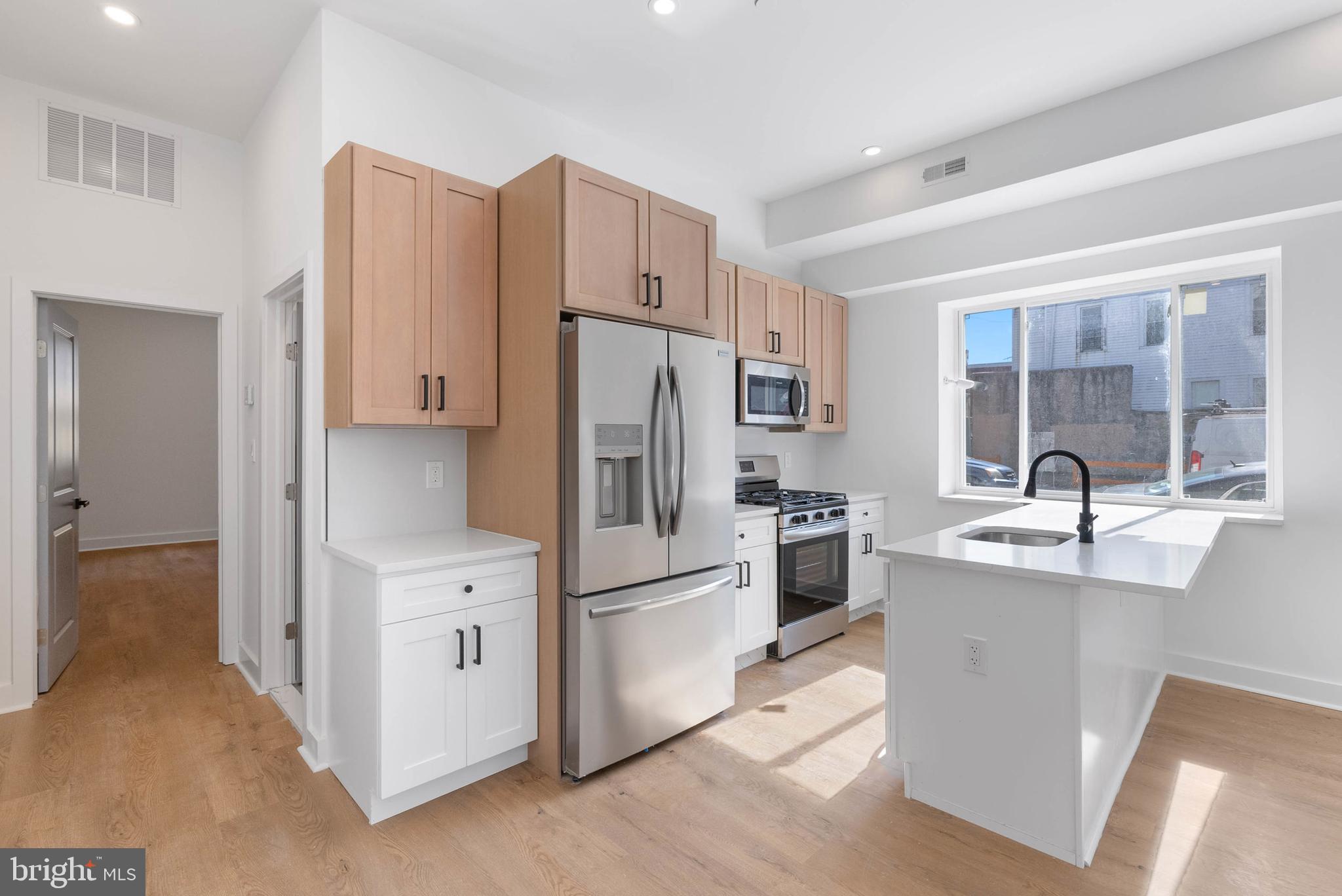 This stunning newly renovated triplex is located in the heart of the Point Breeze neighborhood in Philadelphia, offering modern design and high-end finishes throughout. Each of the three spacious units is thoughtfully designed to provide comfort, functionality, and stylish living. The first unit, spanning the first floor and lower level, features two bedrooms and two bathrooms. It boasts a large living room that provides ample space for relaxation and entertainment. Additionally, this unit includes in-unit laundry for added convenience. The second unit, situated on the second floor, also offers two bedrooms and two bathrooms. A rear deck extends the living space outdoors, providing a private area to unwind. This unit is equipped with a stacked washer and dryer, ensuring ease and efficiency in daily routines. The third unit, located on the top floor, includes two bedrooms and two bathrooms and boasts a large private roof deck, where residents can relax. It also features a stacked washer and dryer, offering in-unit laundry convenience. Situated in the desirable Point Breeze neighborhood, this beautiful triplex is an excellent opportunity for investors or owner-occupants seeking a modern, move-in-ready property. Taxes and square footage are the responsibility of the buyer to have verified independently.