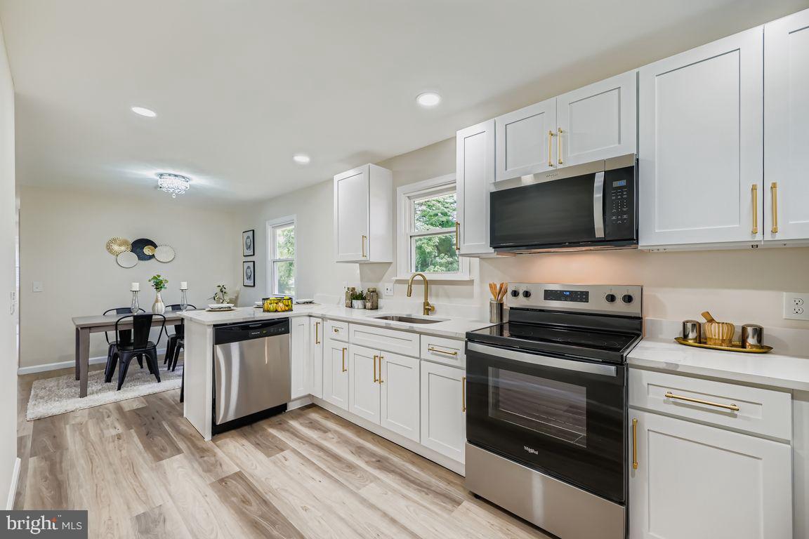 ✨ Welcome Home! ✨
Welcome to a home that perfectly balances refined elegance with everyday comfort. At its heart lies the open-concept kitchen and dining area—gorgeously upgraded with high-end finishes, expansive counter space, and seamless flow for both entertaining in style and gathering with loved ones. Whether hosting a dinner party or sharing a weeknight meal, this space is designed to bring people together.
The main level features a serene primary suite with a spa-inspired ensuite bath, creating a true retreat at day’s end. Two additional bedrooms and a beautifully appointed hall bath complete the level, offering comfort and function for family and guests alike.
The finished lower level expands the home’s versatility, with flexible space for movie nights, workouts, or guest accommodations—including a fourth bedroom and washer/dryer hookup to make daily living effortless.
Step outside to the screened-in porch and private backyard oasis, where mature trees create the perfect mix of sun and shade. From summer barbecues to quiet evenings under the stars, this outdoor space is made for moments big and small.
With a garage, extended driveway, and additional parking pad, convenience meets style in every detail. More than just a house, this residence is a sanctuary—a place to celebrate, connect, and elevate your lifestyle.
This home is more than a place to live
—it’s a haven to recharge, create memories, and truly feel at home.
—it’s a luxurious retreat, designed to elevate everyday living.
This home isn’t just four walls—it’s a place to rest, recharge, and fill your days with joy and connection.