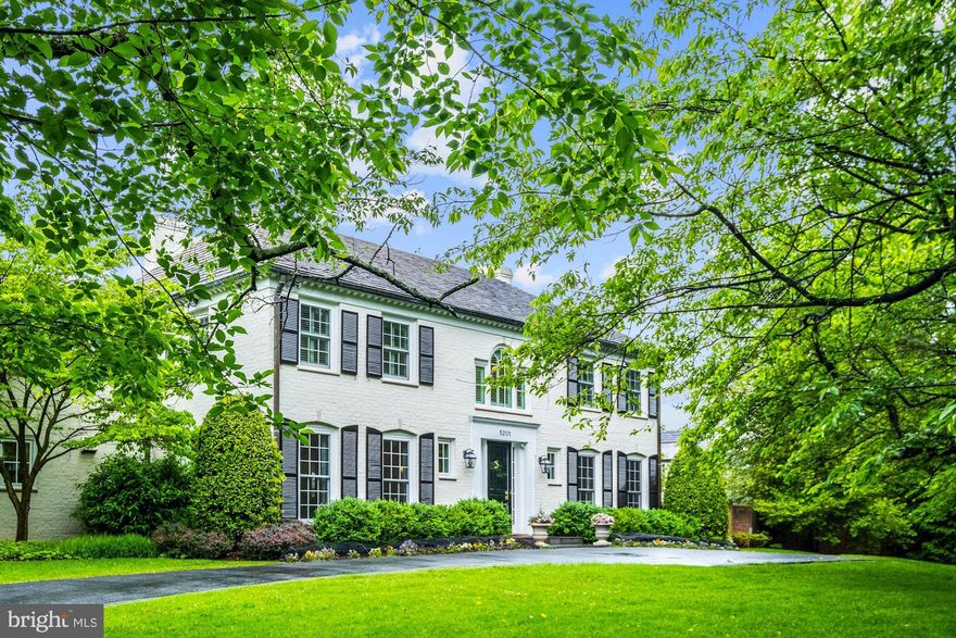 Classic white brick colonial with circular drive,  redone head to toe with sophistication and warmth.  This house doesn't skip a beat going  from an elegant home ready for entertaining inside and out  to a house and yard teeming with children.  Everything is in the right place,  the rooms are gracious and large and the flow is great!  High end finishes throughout, beautiful all new windows and doors, tall ceilings, gorgeous floors, all new high-end baths, tons of built-ins everywhere, great built-out closets and an incredible separate Studio/Office in the back. Large, custom kitchen opens to large breakfast room opens to large great room/family/room/living room.  Handsome  library. Lovely large formal dining room and gracious large entrance foyer.  Fantastic owner's suite. Excellent lower level.  All doors open on grade to a large 12,000+ sq. ft, lot  with  handsome flagstone terraces, a  grilling area right off the kitchen,  a large grassy yard perfect for kicking a soccer ball around or a game of croquet.  Fully-fenced with an automatic gate across the side driveway. Agent related to Seller.