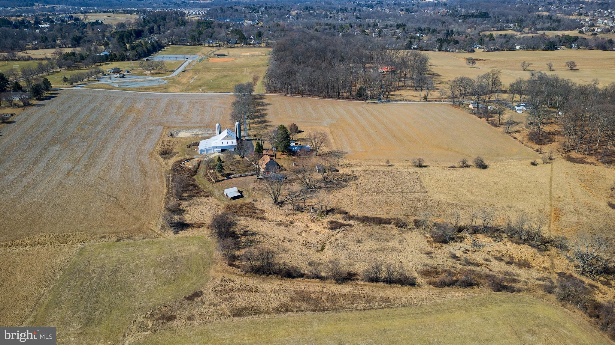 This pristine 71-acre parcel is part of a Natural Lands conservation easement, where open space and picturesque vistas have been preserved. Situated on scenic Dilworth Rd in East Brandywine Township, much of the land is tillable farmland, a portion of which is currently leased to a crop farming operation. There is also an area of natural woodland, as well as a wetlands area with a headwater tributary to the East Branch of the Brandywine Creek. 4 acres may be designated for the construction of a residence, offering a unique opportunity to become the next steward of protected open space in East Brandywine. The conservation easement is designed for the enhancement and protection of native plant species, water quality, woodland integrity and biodiversity of wildlife habitat. A selection of permitted uses is allowable within Best Management Practices as outlined in the easement, which also provides for the possibility of creating a future public trail to run along the southern property edge between Dilworth Rd and Corner Ketch Rd. A copy of the easement may be made available upon serious inquiry. This beautiful property is located within minutes of Brandywine Wallace Elementary School, and it’s situated directly across the street from East Brandywine Township Park which offers ballfields, tennis courts, walking trails, and community events. For those with a calling toward land stewardship, farmland or habitat preservation, this unique opportunity is one to explore.